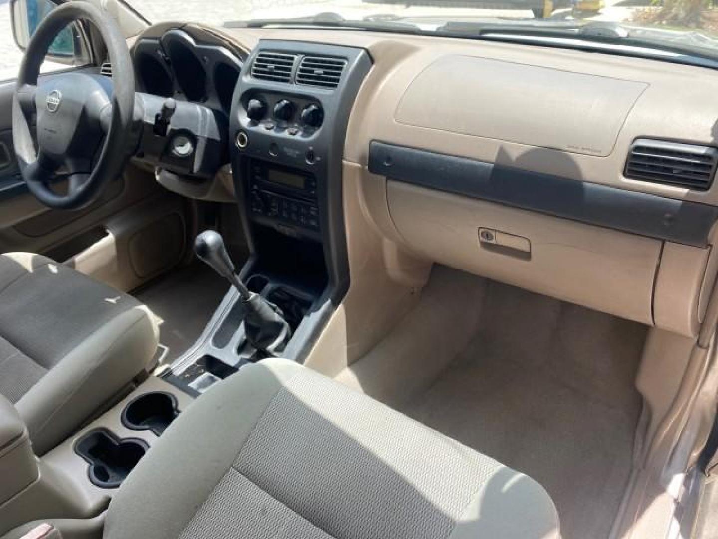 2004 Radiant Silver Metallic /Gray Nissan Frontier 2WD XE LOW MILES 70,508 (1N6DD26T74C) with an 2.4L DOHC SMPI 16-Valve 4-Cyl Engine engine, Manual transmission, located at 4701 North Dixie Hwy, Pompano Beach, FL, 33064, (954) 422-2889, 26.240938, -80.123474 - OUR WEBPAGE FLORIDACARS1.COM HAS OVER 100 PHOTOS AND FREE CARFAX LINK 2004 NISSAN FRONTIER VIN: 1N6DD26T74C451236 CLUB CAB PICKUP 2.4L I4 F DOHC 16V GASOLINE REAR WHEEL DRIVE Top Features Bed Liner Cloth Seats Basic Features ABS Brakes AM/FM Stereo Air Conditioning CD Audio Manual Transmission Power - Photo#91