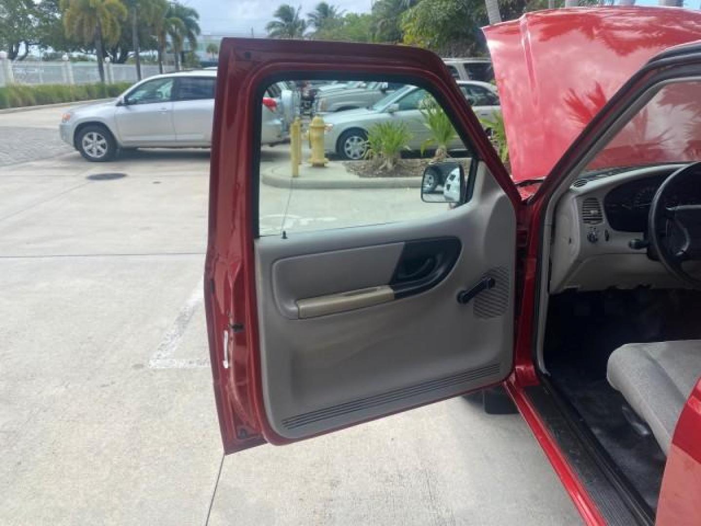 2000 Bright Red /Medium Graphite Ford Ranger XL LOW MILES 68,660 5 SPD (1FTYR10C5YT) with an 2.5L SOHC SEFI 4-Cyl Engine engine, Manual transmission, located at 4701 North Dixie Hwy, Pompano Beach, FL, 33064, (954) 422-2889, 26.240938, -80.123474 - OUR WEBPAGE FLORIDACARS1.COM HAS OVER 100 PHOTOS AND FREE CARFAX LINK 2000 FORD RANGER XL VIN: 1FTYR10C5YTB43464 1 F T Y R 1 0 C 5 Y T B 4 3 4 6 4 PICKUP 2.5L I4 F SOHC 8V GASOLINE REAR WHEEL DRIVE Top Features Bed Liner Cloth Seats Tow Hitch Vinyl Seats Basic Features ABS Brakes AM/FM Stereo CD Aud - Photo#9