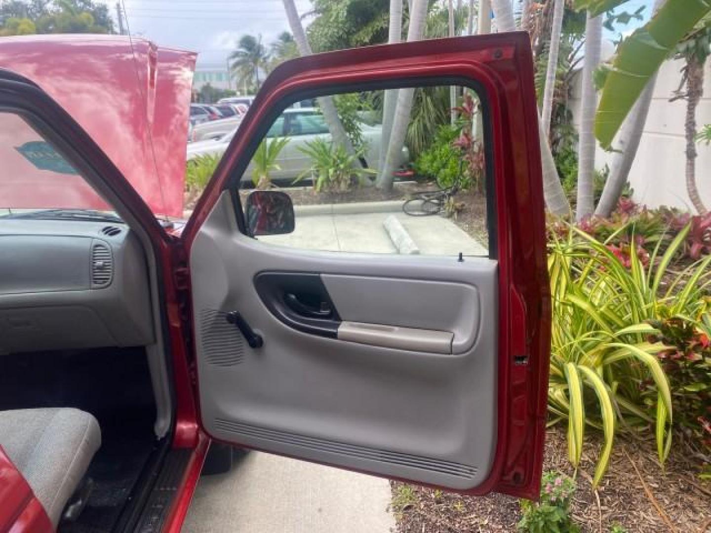 2000 Bright Red /Medium Graphite Ford Ranger XL LOW MILES 68,660 5 SPD (1FTYR10C5YT) with an 2.5L SOHC SEFI 4-Cyl Engine engine, Manual transmission, located at 4701 North Dixie Hwy, Pompano Beach, FL, 33064, (954) 422-2889, 26.240938, -80.123474 - OUR WEBPAGE FLORIDACARS1.COM HAS OVER 100 PHOTOS AND FREE CARFAX LINK 2000 FORD RANGER XL VIN: 1FTYR10C5YTB43464 1 F T Y R 1 0 C 5 Y T B 4 3 4 6 4 PICKUP 2.5L I4 F SOHC 8V GASOLINE REAR WHEEL DRIVE Top Features Bed Liner Cloth Seats Tow Hitch Vinyl Seats Basic Features ABS Brakes AM/FM Stereo CD Aud - Photo#11