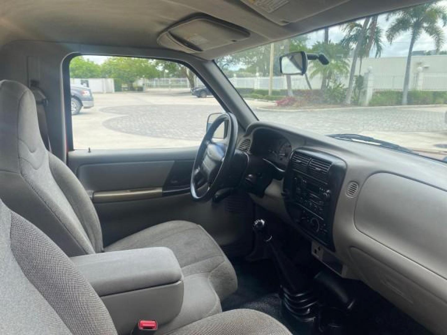 2000 Bright Red /Medium Graphite Ford Ranger XL LOW MILES 68,660 5 SPD (1FTYR10C5YT) with an 2.5L SOHC SEFI 4-Cyl Engine engine, Manual transmission, located at 4701 North Dixie Hwy, Pompano Beach, FL, 33064, (954) 422-2889, 26.240938, -80.123474 - OUR WEBPAGE FLORIDACARS1.COM HAS OVER 100 PHOTOS AND FREE CARFAX LINK 2000 FORD RANGER XL VIN: 1FTYR10C5YTB43464 1 F T Y R 1 0 C 5 Y T B 4 3 4 6 4 PICKUP 2.5L I4 F SOHC 8V GASOLINE REAR WHEEL DRIVE Top Features Bed Liner Cloth Seats Tow Hitch Vinyl Seats Basic Features ABS Brakes AM/FM Stereo CD Aud - Photo#99