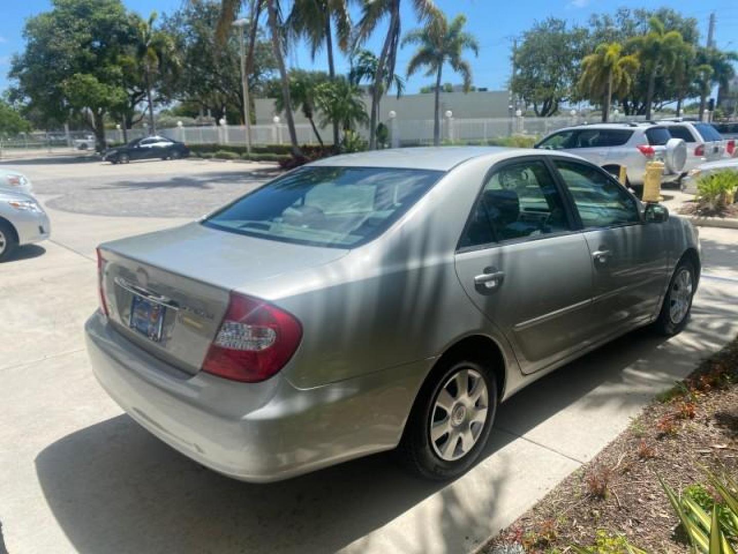 2003 Phantom Gray Pearl /Stone Toyota Camry LE 1 OWNER LOW MILES 68,159 (4T1BE32K23U) with an 2.4L DOHC Vvti 16-Valve 4-Cyl Engine engine, Automatic transmission, located at 4701 North Dixie Hwy, Pompano Beach, FL, 33064, (954) 422-2889, 26.240938, -80.123474 - OUR WEBPAGE FLORIDACARS1.COM HAS OVER 100 PHOTOS AND FREE CARFAX LINK 2003 TOYOTA CAMRY LE VIN: 4T1BE32K23U150498 4 T 1 B E 3 2 K 2 3 U 1 5 0 4 9 8 SEDAN 4 DR 2.4L I4 F DOHC 16V GASOLINE FRONT WHEEL DRIVE Top Features Cloth Seats Basic Features ABS Brakes Automatic Transmission Power Locks Power Win - Photo#7
