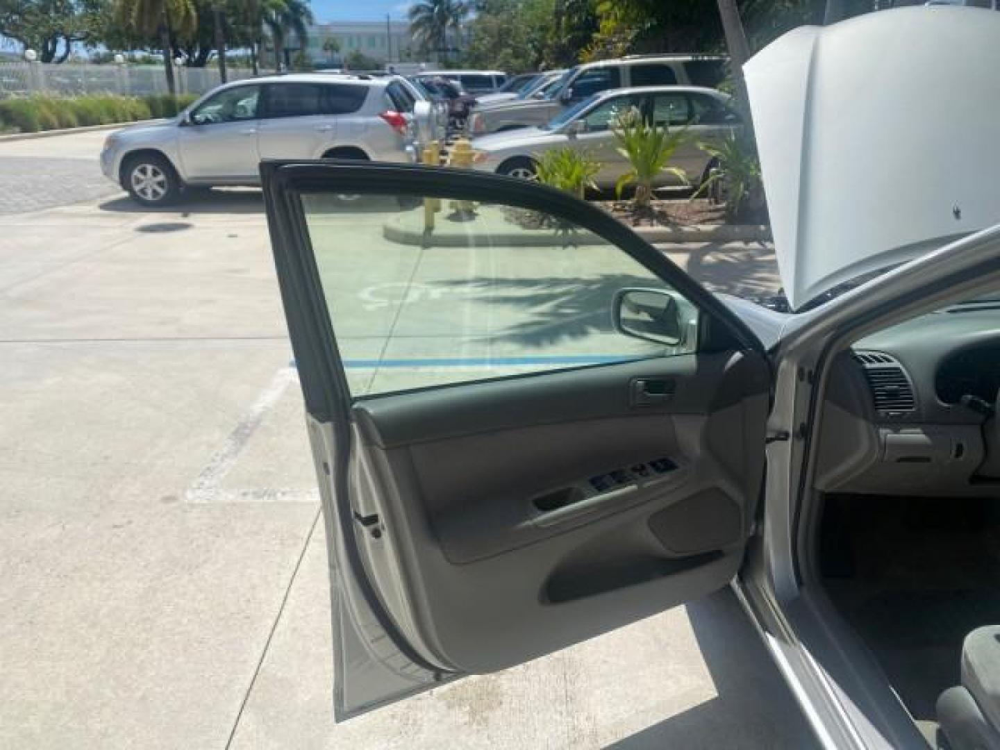 2003 Phantom Gray Pearl /Stone Toyota Camry LE 1 OWNER LOW MILES 68,159 (4T1BE32K23U) with an 2.4L DOHC Vvti 16-Valve 4-Cyl Engine engine, Automatic transmission, located at 4701 North Dixie Hwy, Pompano Beach, FL, 33064, (954) 422-2889, 26.240938, -80.123474 - OUR WEBPAGE FLORIDACARS1.COM HAS OVER 100 PHOTOS AND FREE CARFAX LINK 2003 TOYOTA CAMRY LE VIN: 4T1BE32K23U150498 4 T 1 B E 3 2 K 2 3 U 1 5 0 4 9 8 SEDAN 4 DR 2.4L I4 F DOHC 16V GASOLINE FRONT WHEEL DRIVE Top Features Cloth Seats Basic Features ABS Brakes Automatic Transmission Power Locks Power Win - Photo#9