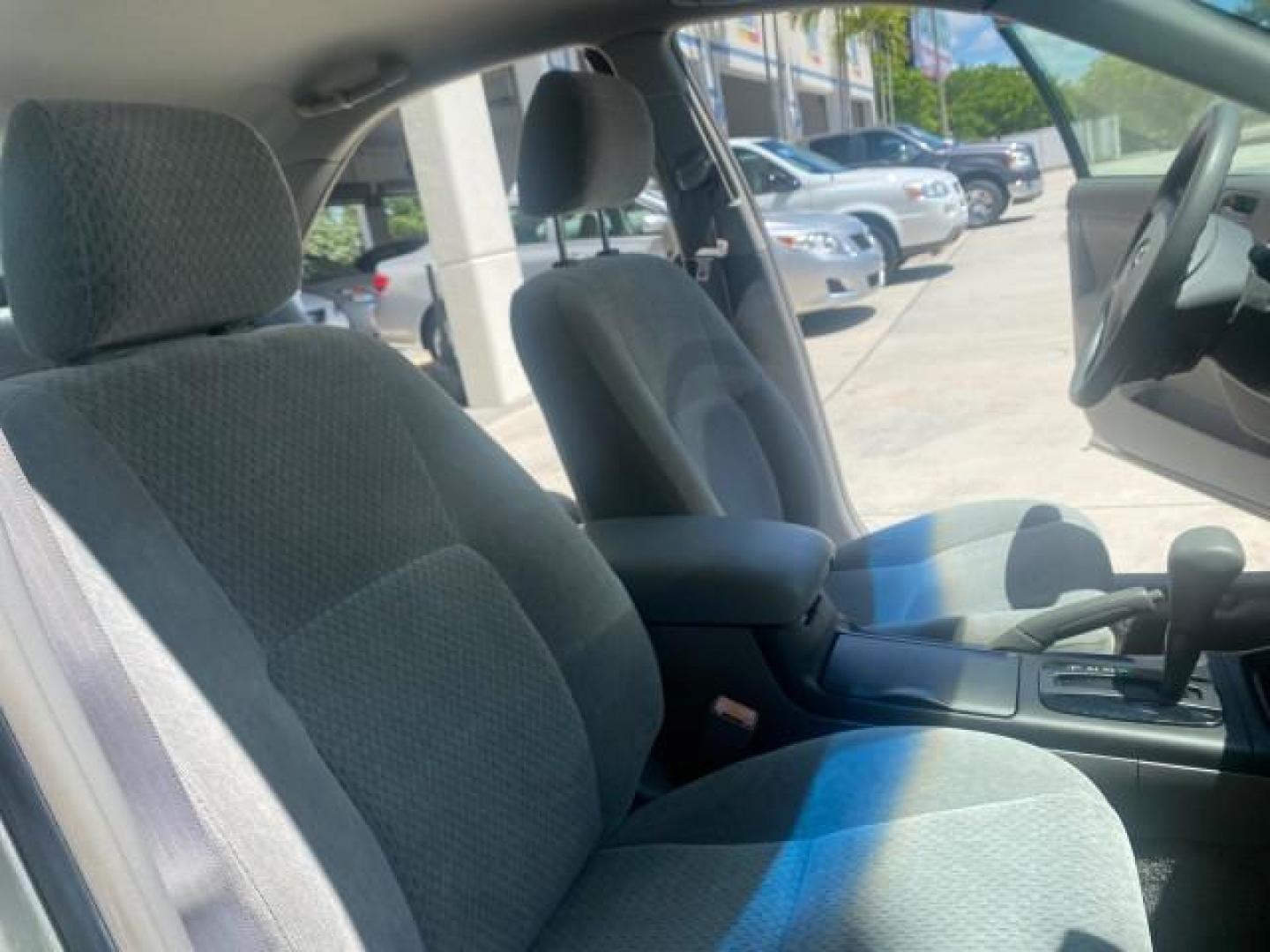 2003 Phantom Gray Pearl /Stone Toyota Camry LE 1 OWNER LOW MILES 68,159 (4T1BE32K23U) with an 2.4L DOHC Vvti 16-Valve 4-Cyl Engine engine, Automatic transmission, located at 4701 North Dixie Hwy, Pompano Beach, FL, 33064, (954) 422-2889, 26.240938, -80.123474 - OUR WEBPAGE FLORIDACARS1.COM HAS OVER 100 PHOTOS AND FREE CARFAX LINK 2003 TOYOTA CAMRY LE VIN: 4T1BE32K23U150498 4 T 1 B E 3 2 K 2 3 U 1 5 0 4 9 8 SEDAN 4 DR 2.4L I4 F DOHC 16V GASOLINE FRONT WHEEL DRIVE Top Features Cloth Seats Basic Features ABS Brakes Automatic Transmission Power Locks Power Win - Photo#12