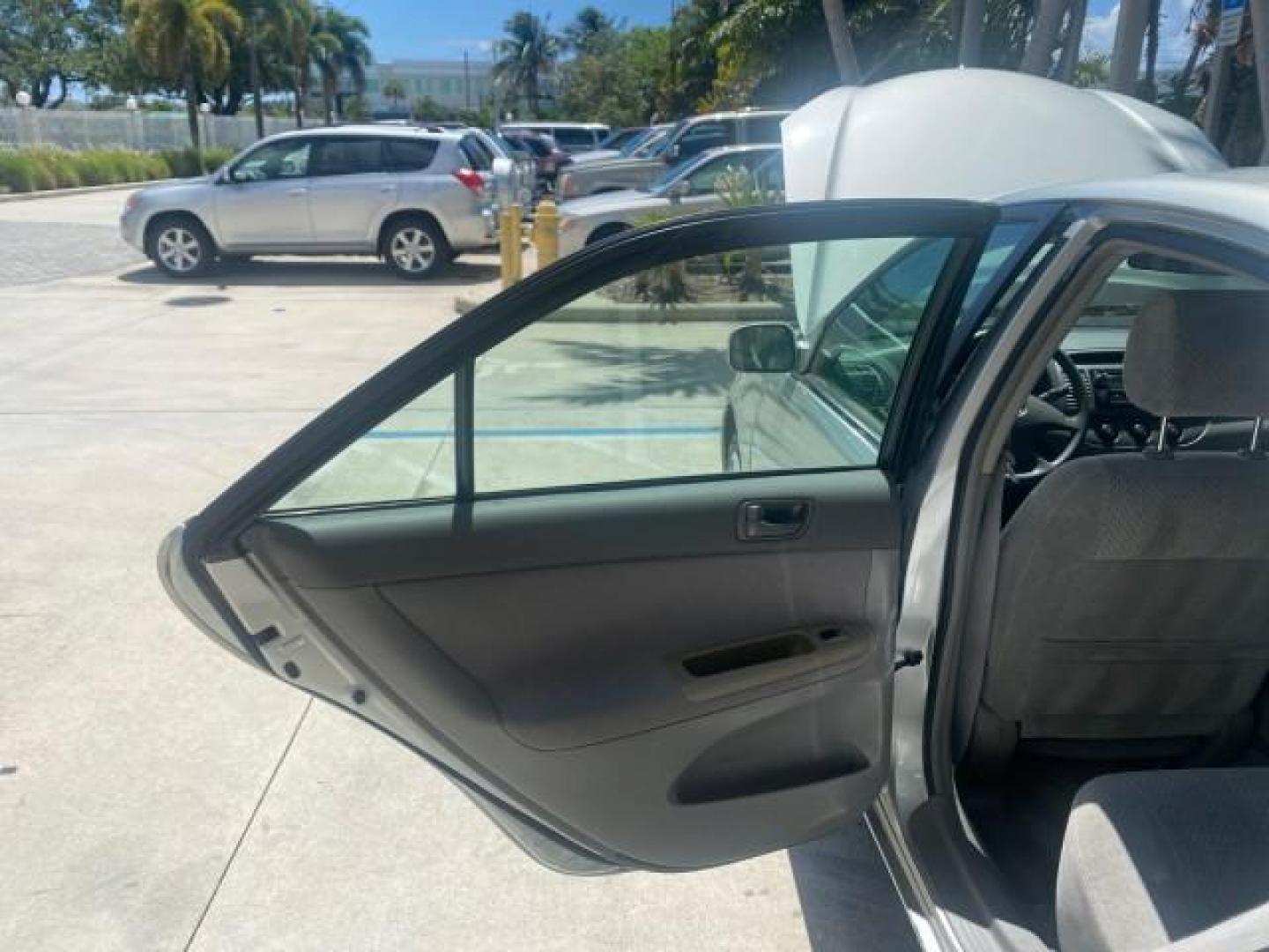 2003 Phantom Gray Pearl /Stone Toyota Camry LE 1 OWNER LOW MILES 68,159 (4T1BE32K23U) with an 2.4L DOHC Vvti 16-Valve 4-Cyl Engine engine, Automatic transmission, located at 4701 North Dixie Hwy, Pompano Beach, FL, 33064, (954) 422-2889, 26.240938, -80.123474 - OUR WEBPAGE FLORIDACARS1.COM HAS OVER 100 PHOTOS AND FREE CARFAX LINK 2003 TOYOTA CAMRY LE VIN: 4T1BE32K23U150498 4 T 1 B E 3 2 K 2 3 U 1 5 0 4 9 8 SEDAN 4 DR 2.4L I4 F DOHC 16V GASOLINE FRONT WHEEL DRIVE Top Features Cloth Seats Basic Features ABS Brakes Automatic Transmission Power Locks Power Win - Photo#13