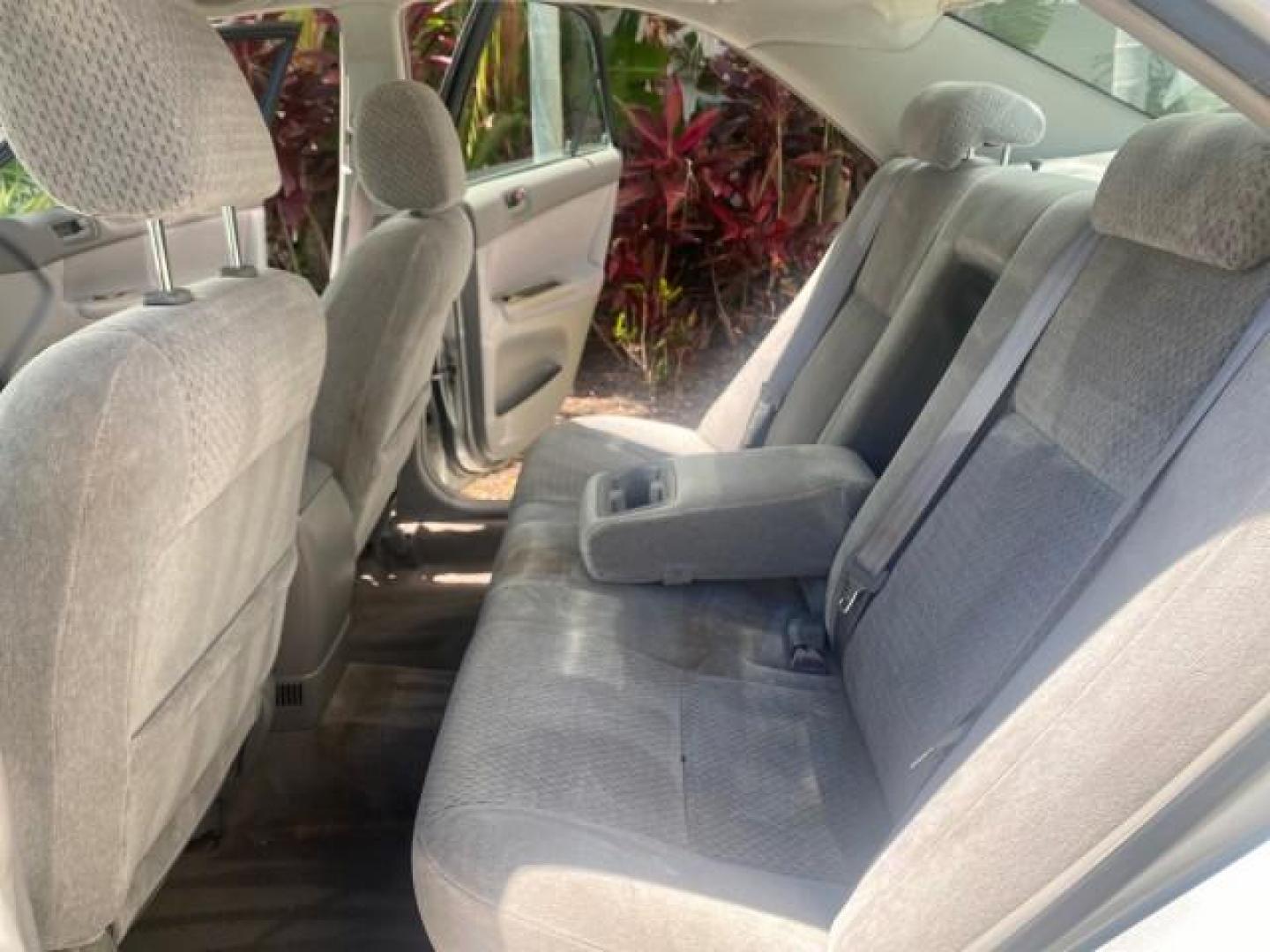2003 Phantom Gray Pearl /Stone Toyota Camry LE 1 OWNER LOW MILES 68,159 (4T1BE32K23U) with an 2.4L DOHC Vvti 16-Valve 4-Cyl Engine engine, Automatic transmission, located at 4701 North Dixie Hwy, Pompano Beach, FL, 33064, (954) 422-2889, 26.240938, -80.123474 - OUR WEBPAGE FLORIDACARS1.COM HAS OVER 100 PHOTOS AND FREE CARFAX LINK 2003 TOYOTA CAMRY LE VIN: 4T1BE32K23U150498 4 T 1 B E 3 2 K 2 3 U 1 5 0 4 9 8 SEDAN 4 DR 2.4L I4 F DOHC 16V GASOLINE FRONT WHEEL DRIVE Top Features Cloth Seats Basic Features ABS Brakes Automatic Transmission Power Locks Power Win - Photo#14