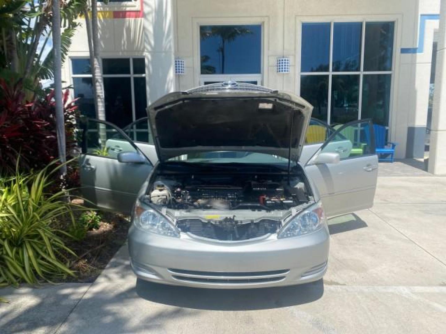 2003 Phantom Gray Pearl /Stone Toyota Camry LE 1 OWNER LOW MILES 68,159 (4T1BE32K23U) with an 2.4L DOHC Vvti 16-Valve 4-Cyl Engine engine, Automatic transmission, located at 4701 North Dixie Hwy, Pompano Beach, FL, 33064, (954) 422-2889, 26.240938, -80.123474 - OUR WEBPAGE FLORIDACARS1.COM HAS OVER 100 PHOTOS AND FREE CARFAX LINK 2003 TOYOTA CAMRY LE VIN: 4T1BE32K23U150498 4 T 1 B E 3 2 K 2 3 U 1 5 0 4 9 8 SEDAN 4 DR 2.4L I4 F DOHC 16V GASOLINE FRONT WHEEL DRIVE Top Features Cloth Seats Basic Features ABS Brakes Automatic Transmission Power Locks Power Win - Photo#16