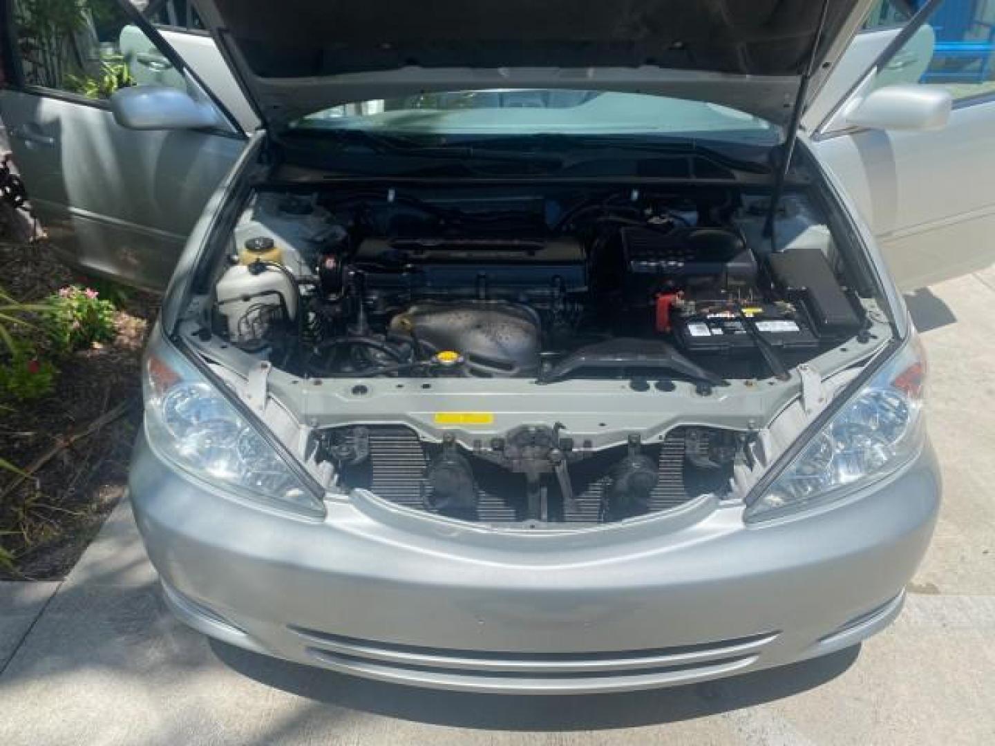 2003 Phantom Gray Pearl /Stone Toyota Camry LE 1 OWNER LOW MILES 68,159 (4T1BE32K23U) with an 2.4L DOHC Vvti 16-Valve 4-Cyl Engine engine, Automatic transmission, located at 4701 North Dixie Hwy, Pompano Beach, FL, 33064, (954) 422-2889, 26.240938, -80.123474 - OUR WEBPAGE FLORIDACARS1.COM HAS OVER 100 PHOTOS AND FREE CARFAX LINK 2003 TOYOTA CAMRY LE VIN: 4T1BE32K23U150498 4 T 1 B E 3 2 K 2 3 U 1 5 0 4 9 8 SEDAN 4 DR 2.4L I4 F DOHC 16V GASOLINE FRONT WHEEL DRIVE Top Features Cloth Seats Basic Features ABS Brakes Automatic Transmission Power Locks Power Win - Photo#17