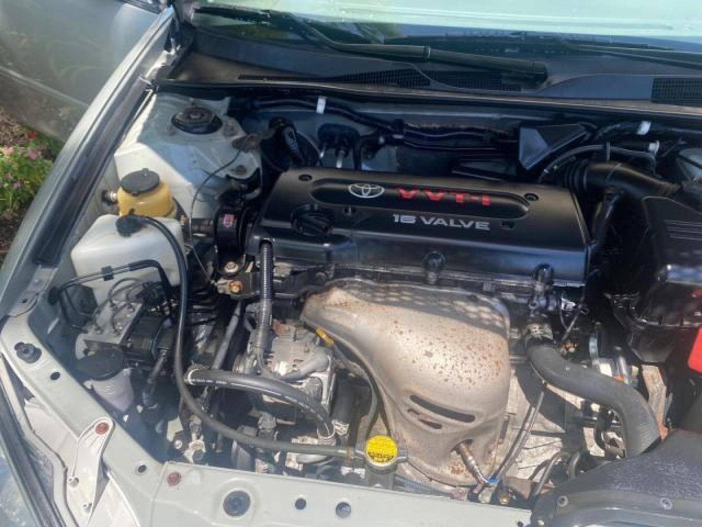 2003 Phantom Gray Pearl /Stone Toyota Camry LE 1 OWNER LOW MILES 68,159 (4T1BE32K23U) with an 2.4L DOHC Vvti 16-Valve 4-Cyl Engine engine, Automatic transmission, located at 4701 North Dixie Hwy, Pompano Beach, FL, 33064, (954) 422-2889, 26.240938, -80.123474 - OUR WEBPAGE FLORIDACARS1.COM HAS OVER 100 PHOTOS AND FREE CARFAX LINK 2003 TOYOTA CAMRY LE VIN: 4T1BE32K23U150498 4 T 1 B E 3 2 K 2 3 U 1 5 0 4 9 8 SEDAN 4 DR 2.4L I4 F DOHC 16V GASOLINE FRONT WHEEL DRIVE Top Features Cloth Seats Basic Features ABS Brakes Automatic Transmission Power Locks Power Win - Photo#25