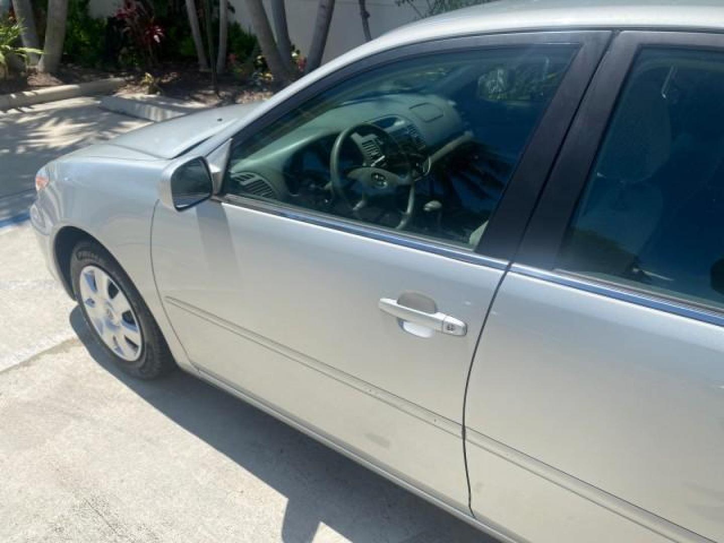 2003 Phantom Gray Pearl /Stone Toyota Camry LE 1 OWNER LOW MILES 68,159 (4T1BE32K23U) with an 2.4L DOHC Vvti 16-Valve 4-Cyl Engine engine, Automatic transmission, located at 4701 North Dixie Hwy, Pompano Beach, FL, 33064, (954) 422-2889, 26.240938, -80.123474 - OUR WEBPAGE FLORIDACARS1.COM HAS OVER 100 PHOTOS AND FREE CARFAX LINK 2003 TOYOTA CAMRY LE VIN: 4T1BE32K23U150498 4 T 1 B E 3 2 K 2 3 U 1 5 0 4 9 8 SEDAN 4 DR 2.4L I4 F DOHC 16V GASOLINE FRONT WHEEL DRIVE Top Features Cloth Seats Basic Features ABS Brakes Automatic Transmission Power Locks Power Win - Photo#27