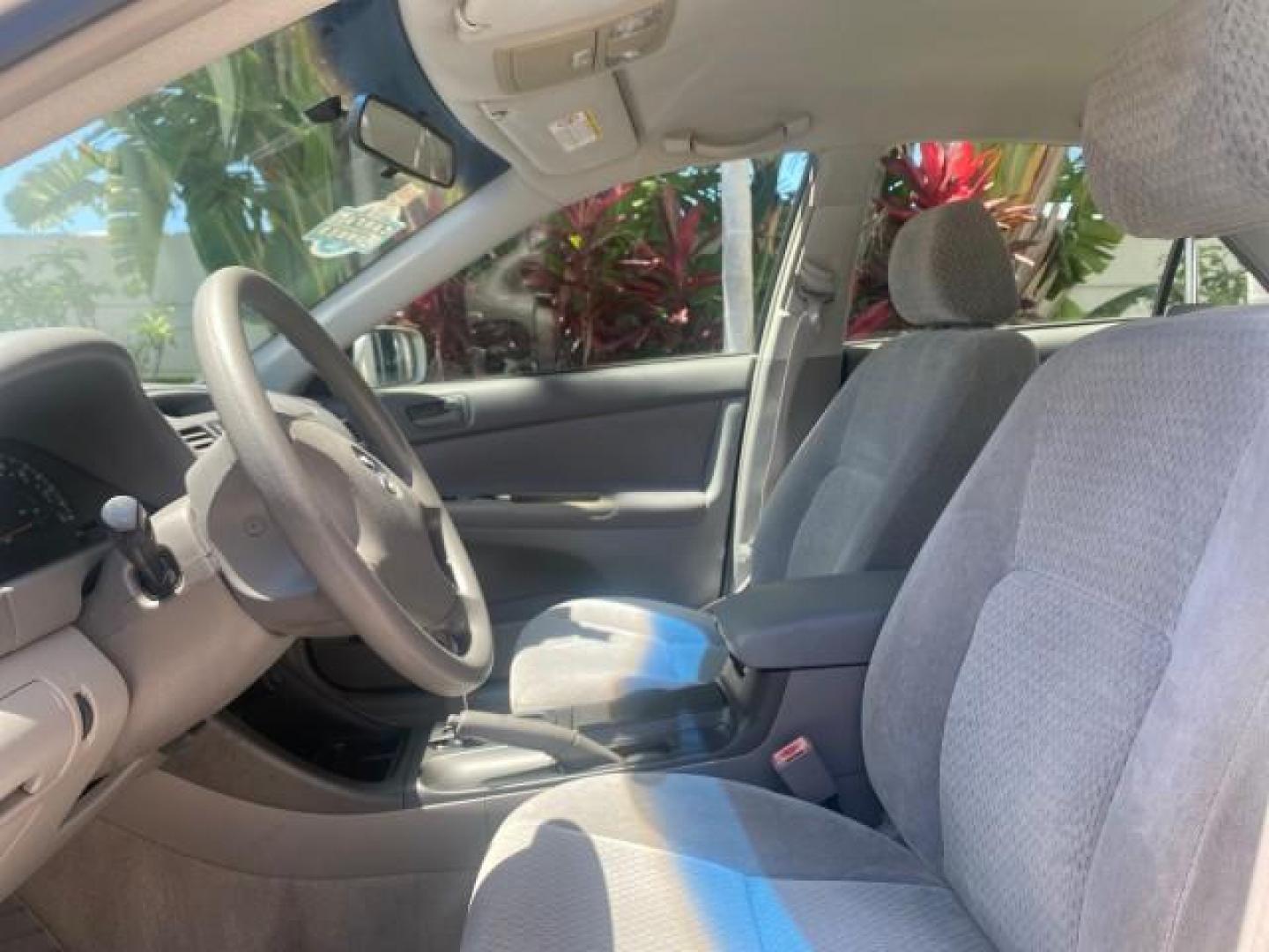 2003 Phantom Gray Pearl /Stone Toyota Camry LE 1 OWNER LOW MILES 68,159 (4T1BE32K23U) with an 2.4L DOHC Vvti 16-Valve 4-Cyl Engine engine, Automatic transmission, located at 4701 North Dixie Hwy, Pompano Beach, FL, 33064, (954) 422-2889, 26.240938, -80.123474 - OUR WEBPAGE FLORIDACARS1.COM HAS OVER 100 PHOTOS AND FREE CARFAX LINK 2003 TOYOTA CAMRY LE VIN: 4T1BE32K23U150498 4 T 1 B E 3 2 K 2 3 U 1 5 0 4 9 8 SEDAN 4 DR 2.4L I4 F DOHC 16V GASOLINE FRONT WHEEL DRIVE Top Features Cloth Seats Basic Features ABS Brakes Automatic Transmission Power Locks Power Win - Photo#34