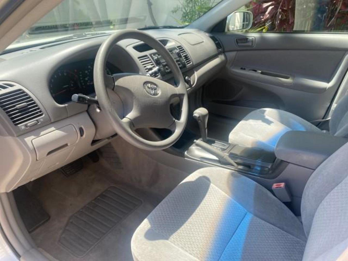 2003 Phantom Gray Pearl /Stone Toyota Camry LE 1 OWNER LOW MILES 68,159 (4T1BE32K23U) with an 2.4L DOHC Vvti 16-Valve 4-Cyl Engine engine, Automatic transmission, located at 4701 North Dixie Hwy, Pompano Beach, FL, 33064, (954) 422-2889, 26.240938, -80.123474 - OUR WEBPAGE FLORIDACARS1.COM HAS OVER 100 PHOTOS AND FREE CARFAX LINK 2003 TOYOTA CAMRY LE VIN: 4T1BE32K23U150498 4 T 1 B E 3 2 K 2 3 U 1 5 0 4 9 8 SEDAN 4 DR 2.4L I4 F DOHC 16V GASOLINE FRONT WHEEL DRIVE Top Features Cloth Seats Basic Features ABS Brakes Automatic Transmission Power Locks Power Win - Photo#37