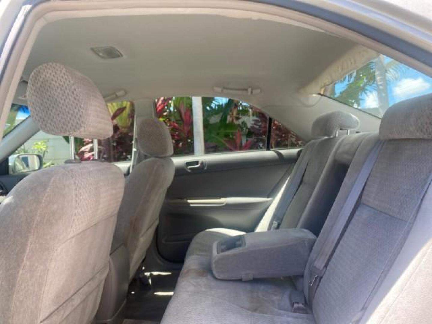 2003 Phantom Gray Pearl /Stone Toyota Camry LE 1 OWNER LOW MILES 68,159 (4T1BE32K23U) with an 2.4L DOHC Vvti 16-Valve 4-Cyl Engine engine, Automatic transmission, located at 4701 North Dixie Hwy, Pompano Beach, FL, 33064, (954) 422-2889, 26.240938, -80.123474 - OUR WEBPAGE FLORIDACARS1.COM HAS OVER 100 PHOTOS AND FREE CARFAX LINK 2003 TOYOTA CAMRY LE VIN: 4T1BE32K23U150498 4 T 1 B E 3 2 K 2 3 U 1 5 0 4 9 8 SEDAN 4 DR 2.4L I4 F DOHC 16V GASOLINE FRONT WHEEL DRIVE Top Features Cloth Seats Basic Features ABS Brakes Automatic Transmission Power Locks Power Win - Photo#65