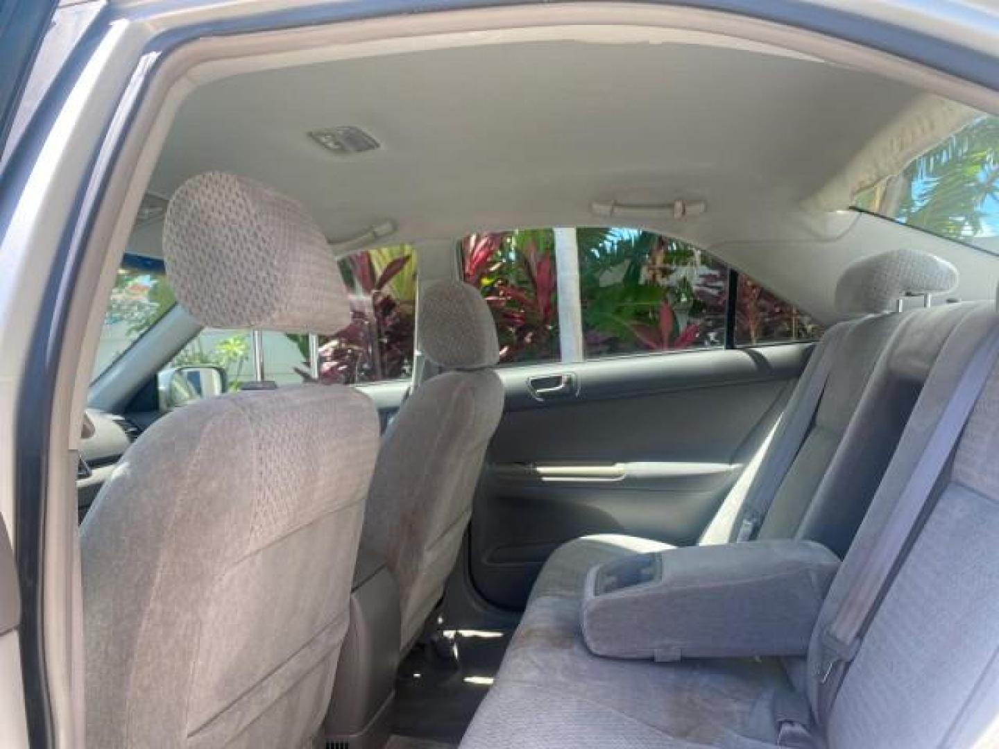 2003 Phantom Gray Pearl /Stone Toyota Camry LE 1 OWNER LOW MILES 68,159 (4T1BE32K23U) with an 2.4L DOHC Vvti 16-Valve 4-Cyl Engine engine, Automatic transmission, located at 4701 North Dixie Hwy, Pompano Beach, FL, 33064, (954) 422-2889, 26.240938, -80.123474 - OUR WEBPAGE FLORIDACARS1.COM HAS OVER 100 PHOTOS AND FREE CARFAX LINK 2003 TOYOTA CAMRY LE VIN: 4T1BE32K23U150498 4 T 1 B E 3 2 K 2 3 U 1 5 0 4 9 8 SEDAN 4 DR 2.4L I4 F DOHC 16V GASOLINE FRONT WHEEL DRIVE Top Features Cloth Seats Basic Features ABS Brakes Automatic Transmission Power Locks Power Win - Photo#66