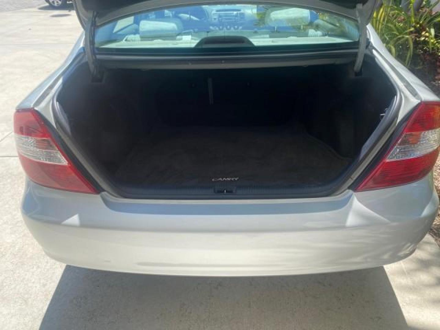 2003 Phantom Gray Pearl /Stone Toyota Camry LE 1 OWNER LOW MILES 68,159 (4T1BE32K23U) with an 2.4L DOHC Vvti 16-Valve 4-Cyl Engine engine, Automatic transmission, located at 4701 North Dixie Hwy, Pompano Beach, FL, 33064, (954) 422-2889, 26.240938, -80.123474 - OUR WEBPAGE FLORIDACARS1.COM HAS OVER 100 PHOTOS AND FREE CARFAX LINK 2003 TOYOTA CAMRY LE VIN: 4T1BE32K23U150498 4 T 1 B E 3 2 K 2 3 U 1 5 0 4 9 8 SEDAN 4 DR 2.4L I4 F DOHC 16V GASOLINE FRONT WHEEL DRIVE Top Features Cloth Seats Basic Features ABS Brakes Automatic Transmission Power Locks Power Win - Photo#79