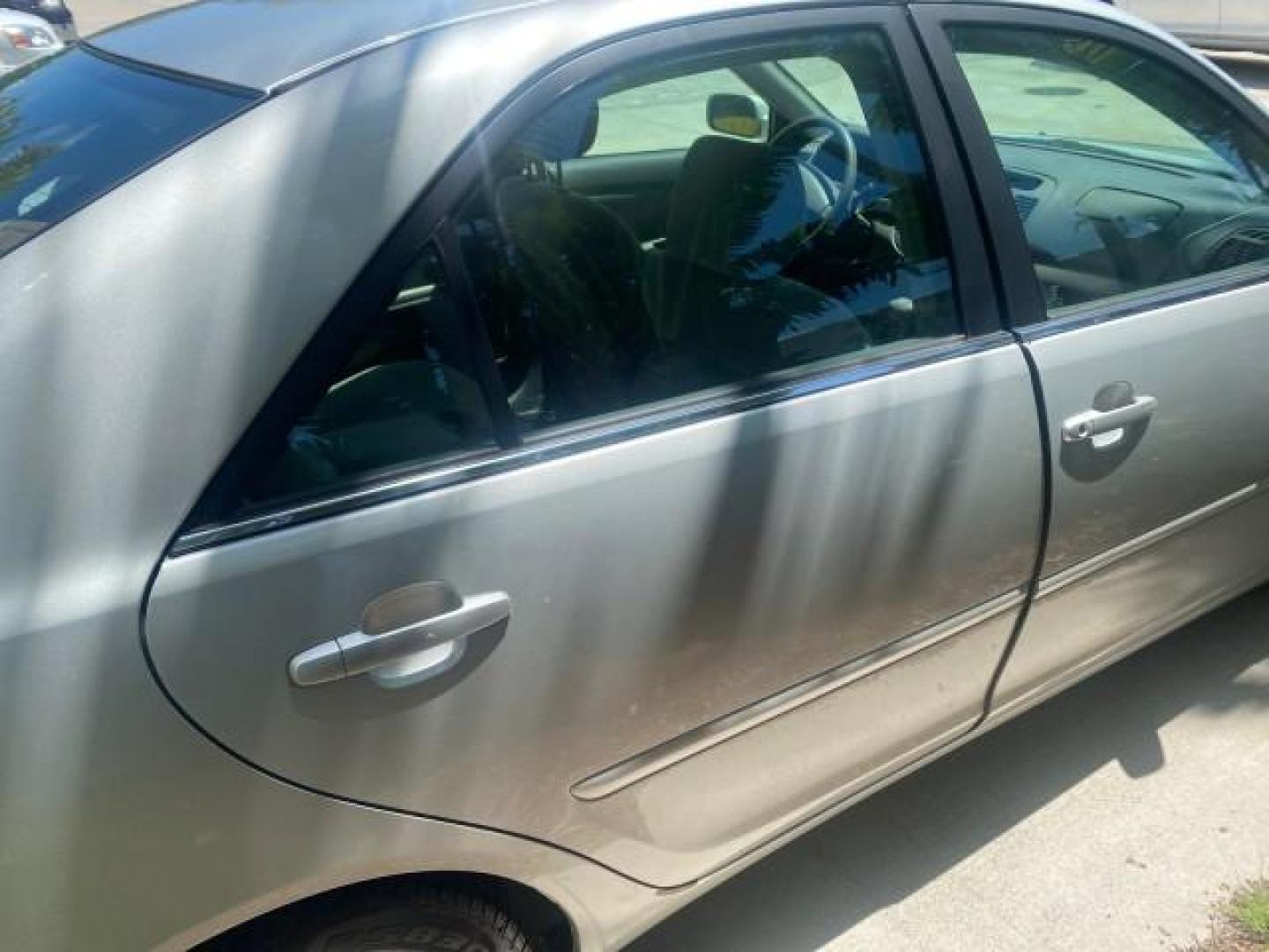 2003 Phantom Gray Pearl /Stone Toyota Camry LE 1 OWNER LOW MILES 68,159 (4T1BE32K23U) with an 2.4L DOHC Vvti 16-Valve 4-Cyl Engine engine, Automatic transmission, located at 4701 North Dixie Hwy, Pompano Beach, FL, 33064, (954) 422-2889, 26.240938, -80.123474 - OUR WEBPAGE FLORIDACARS1.COM HAS OVER 100 PHOTOS AND FREE CARFAX LINK 2003 TOYOTA CAMRY LE VIN: 4T1BE32K23U150498 4 T 1 B E 3 2 K 2 3 U 1 5 0 4 9 8 SEDAN 4 DR 2.4L I4 F DOHC 16V GASOLINE FRONT WHEEL DRIVE Top Features Cloth Seats Basic Features ABS Brakes Automatic Transmission Power Locks Power Win - Photo#86