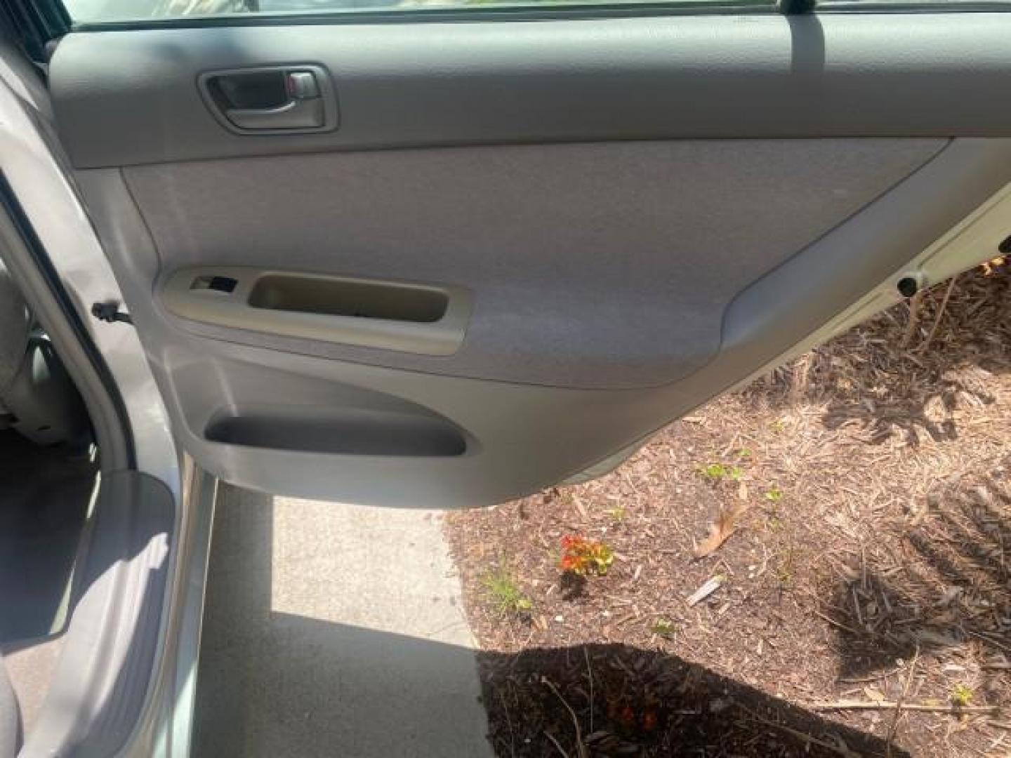 2003 Phantom Gray Pearl /Stone Toyota Camry LE 1 OWNER LOW MILES 68,159 (4T1BE32K23U) with an 2.4L DOHC Vvti 16-Valve 4-Cyl Engine engine, Automatic transmission, located at 4701 North Dixie Hwy, Pompano Beach, FL, 33064, (954) 422-2889, 26.240938, -80.123474 - OUR WEBPAGE FLORIDACARS1.COM HAS OVER 100 PHOTOS AND FREE CARFAX LINK 2003 TOYOTA CAMRY LE VIN: 4T1BE32K23U150498 4 T 1 B E 3 2 K 2 3 U 1 5 0 4 9 8 SEDAN 4 DR 2.4L I4 F DOHC 16V GASOLINE FRONT WHEEL DRIVE Top Features Cloth Seats Basic Features ABS Brakes Automatic Transmission Power Locks Power Win - Photo#88