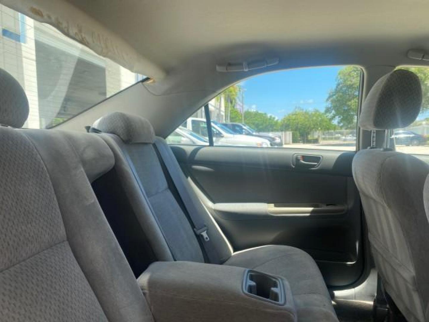 2003 Phantom Gray Pearl /Stone Toyota Camry LE 1 OWNER LOW MILES 68,159 (4T1BE32K23U) with an 2.4L DOHC Vvti 16-Valve 4-Cyl Engine engine, Automatic transmission, located at 4701 North Dixie Hwy, Pompano Beach, FL, 33064, (954) 422-2889, 26.240938, -80.123474 - OUR WEBPAGE FLORIDACARS1.COM HAS OVER 100 PHOTOS AND FREE CARFAX LINK 2003 TOYOTA CAMRY LE VIN: 4T1BE32K23U150498 4 T 1 B E 3 2 K 2 3 U 1 5 0 4 9 8 SEDAN 4 DR 2.4L I4 F DOHC 16V GASOLINE FRONT WHEEL DRIVE Top Features Cloth Seats Basic Features ABS Brakes Automatic Transmission Power Locks Power Win - Photo#90