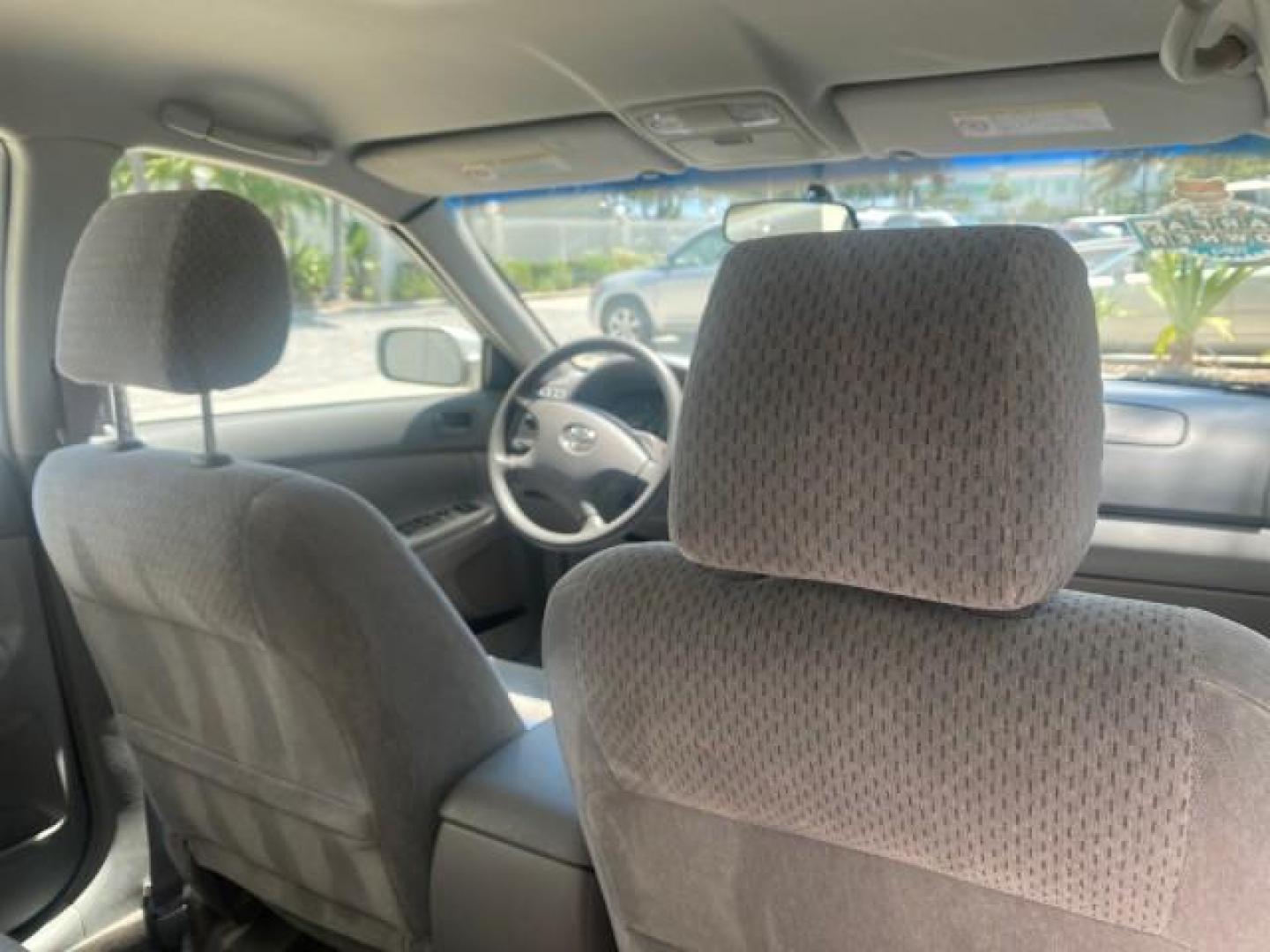 2003 Phantom Gray Pearl /Stone Toyota Camry LE 1 OWNER LOW MILES 68,159 (4T1BE32K23U) with an 2.4L DOHC Vvti 16-Valve 4-Cyl Engine engine, Automatic transmission, located at 4701 North Dixie Hwy, Pompano Beach, FL, 33064, (954) 422-2889, 26.240938, -80.123474 - OUR WEBPAGE FLORIDACARS1.COM HAS OVER 100 PHOTOS AND FREE CARFAX LINK 2003 TOYOTA CAMRY LE VIN: 4T1BE32K23U150498 4 T 1 B E 3 2 K 2 3 U 1 5 0 4 9 8 SEDAN 4 DR 2.4L I4 F DOHC 16V GASOLINE FRONT WHEEL DRIVE Top Features Cloth Seats Basic Features ABS Brakes Automatic Transmission Power Locks Power Win - Photo#94
