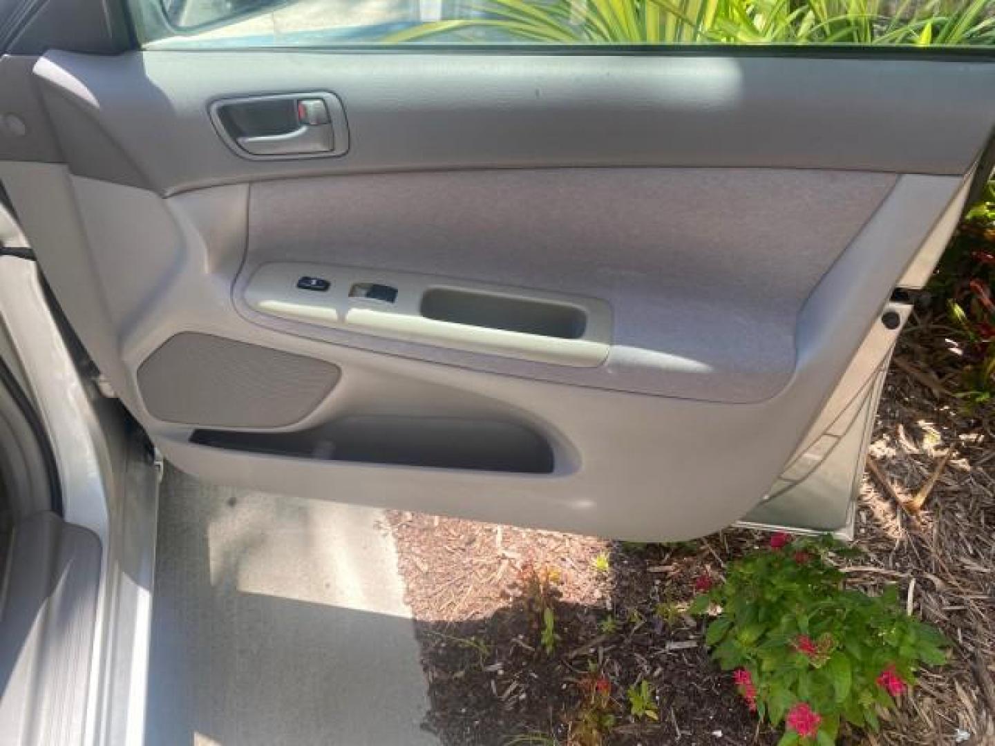 2003 Phantom Gray Pearl /Stone Toyota Camry LE 1 OWNER LOW MILES 68,159 (4T1BE32K23U) with an 2.4L DOHC Vvti 16-Valve 4-Cyl Engine engine, Automatic transmission, located at 4701 North Dixie Hwy, Pompano Beach, FL, 33064, (954) 422-2889, 26.240938, -80.123474 - OUR WEBPAGE FLORIDACARS1.COM HAS OVER 100 PHOTOS AND FREE CARFAX LINK 2003 TOYOTA CAMRY LE VIN: 4T1BE32K23U150498 4 T 1 B E 3 2 K 2 3 U 1 5 0 4 9 8 SEDAN 4 DR 2.4L I4 F DOHC 16V GASOLINE FRONT WHEEL DRIVE Top Features Cloth Seats Basic Features ABS Brakes Automatic Transmission Power Locks Power Win - Photo#97