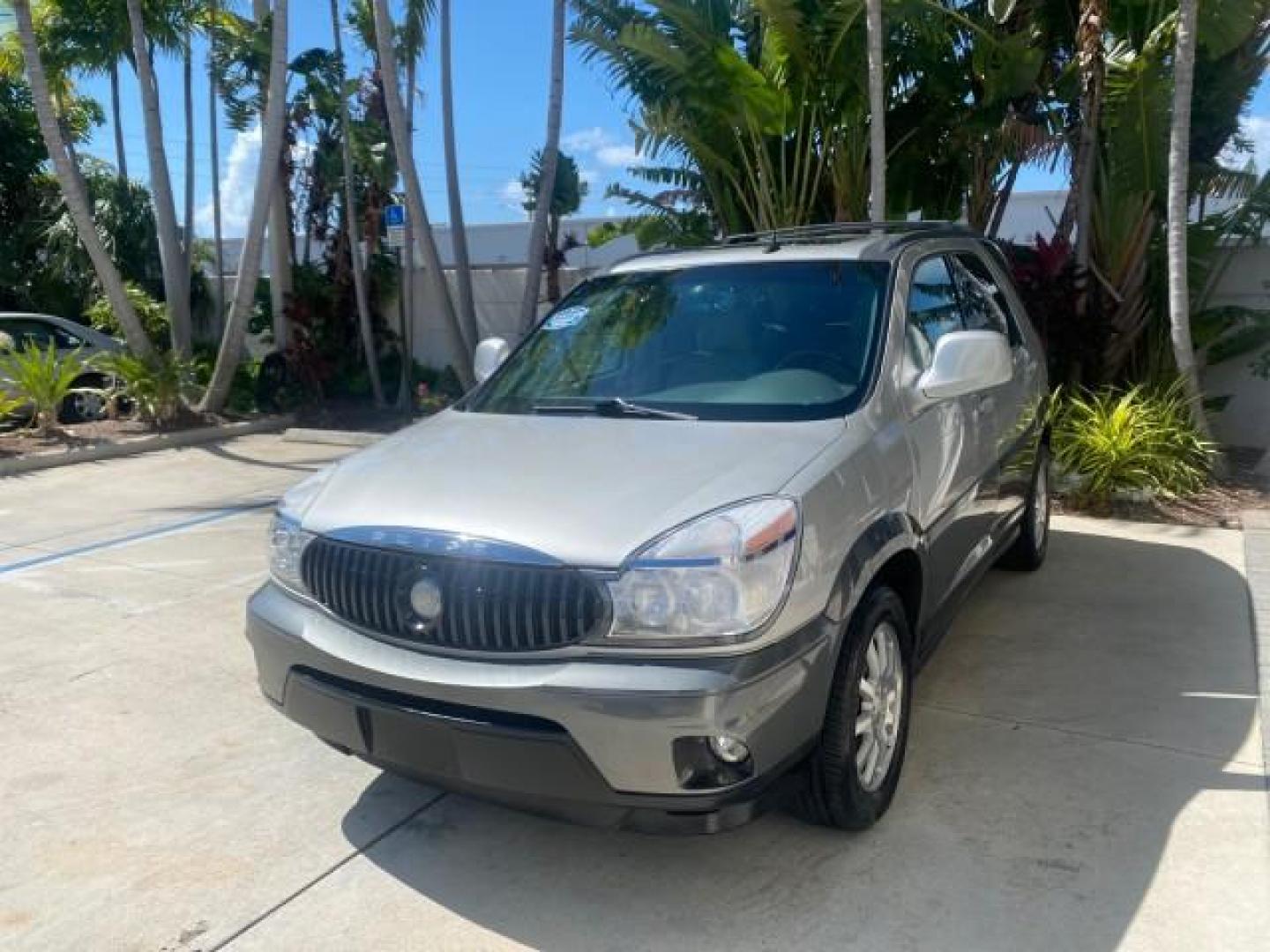 2005 Platinum Metallic /Gray Buick Rendezvous LOW MILES 81,783 3RD ROW (3G5DA03E15S) with an 3.4L 3400 V6 SFI Engine engine, Automatic transmission, located at 4701 North Dixie Hwy, Pompano Beach, FL, 33064, (954) 422-2889, 26.240938, -80.123474 - OUR WEBPAGE FLORIDACARS1.COM HAS OVER 100 PHOTOS AND FREE CARFAX LINK 2005 BUICK RENDEZVOUS CX VIN: 3G5DA03E15S512878 3 G 5 D A 0 3 E 1 5 S 5 1 2 8 7 8 4 DOOR WAGON/SPORT UTILITY 3.4L V6 F GASOLINE FRONT WHEEL DRIVE Top Features Front Seat Heaters Leather Seats Parking Sensors Sunroof(s) Third Row S - Photo#3
