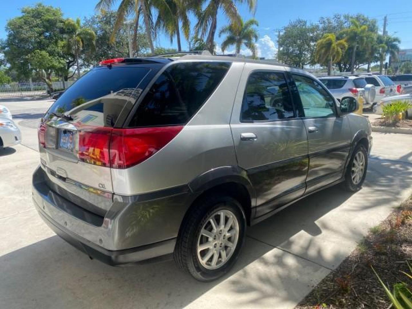 2005 Platinum Metallic /Gray Buick Rendezvous LOW MILES 81,783 3RD ROW (3G5DA03E15S) with an 3.4L 3400 V6 SFI Engine engine, Automatic transmission, located at 4701 North Dixie Hwy, Pompano Beach, FL, 33064, (954) 422-2889, 26.240938, -80.123474 - OUR WEBPAGE FLORIDACARS1.COM HAS OVER 100 PHOTOS AND FREE CARFAX LINK 2005 BUICK RENDEZVOUS CX VIN: 3G5DA03E15S512878 3 G 5 D A 0 3 E 1 5 S 5 1 2 8 7 8 4 DOOR WAGON/SPORT UTILITY 3.4L V6 F GASOLINE FRONT WHEEL DRIVE Top Features Front Seat Heaters Leather Seats Parking Sensors Sunroof(s) Third Row S - Photo#7