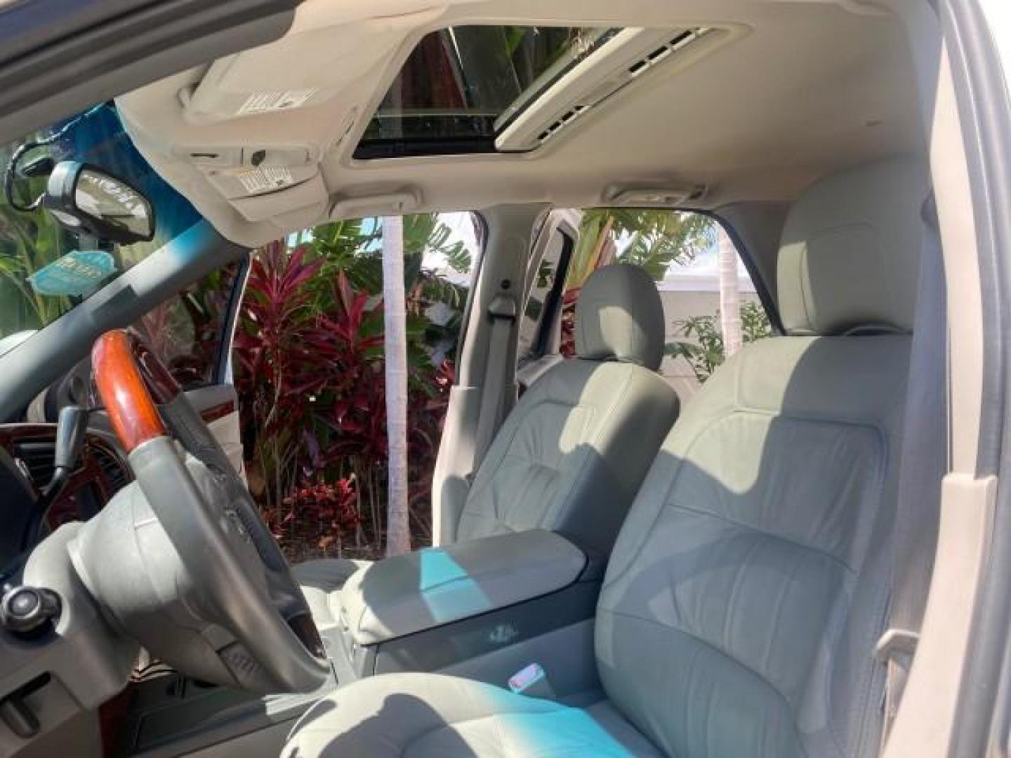 2005 Platinum Metallic /Gray Buick Rendezvous LOW MILES 81,783 3RD ROW (3G5DA03E15S) with an 3.4L 3400 V6 SFI Engine engine, Automatic transmission, located at 4701 North Dixie Hwy, Pompano Beach, FL, 33064, (954) 422-2889, 26.240938, -80.123474 - OUR WEBPAGE FLORIDACARS1.COM HAS OVER 100 PHOTOS AND FREE CARFAX LINK 2005 BUICK RENDEZVOUS CX VIN: 3G5DA03E15S512878 3 G 5 D A 0 3 E 1 5 S 5 1 2 8 7 8 4 DOOR WAGON/SPORT UTILITY 3.4L V6 F GASOLINE FRONT WHEEL DRIVE Top Features Front Seat Heaters Leather Seats Parking Sensors Sunroof(s) Third Row S - Photo#10