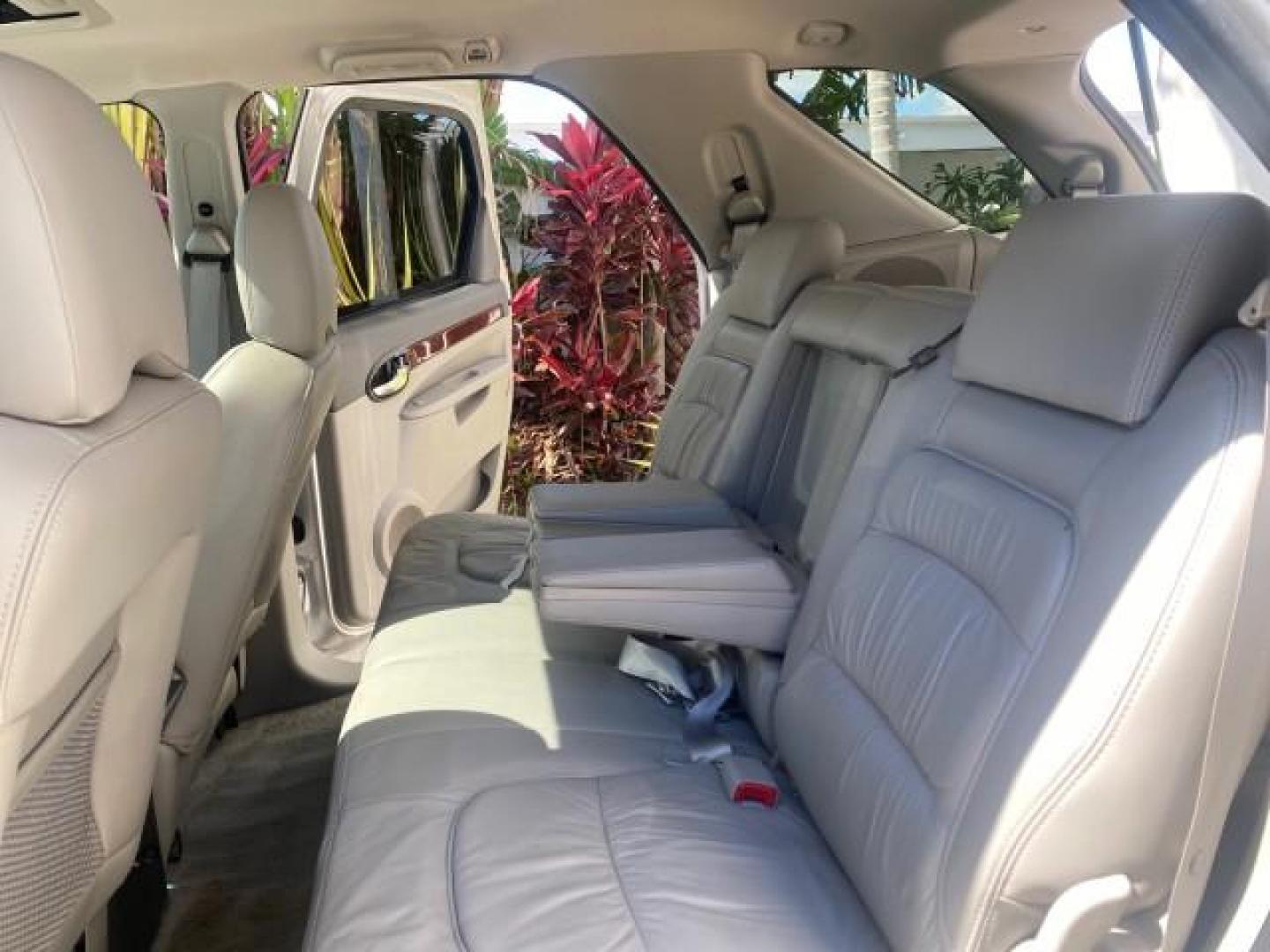 2005 Platinum Metallic /Gray Buick Rendezvous LOW MILES 81,783 3RD ROW (3G5DA03E15S) with an 3.4L 3400 V6 SFI Engine engine, Automatic transmission, located at 4701 North Dixie Hwy, Pompano Beach, FL, 33064, (954) 422-2889, 26.240938, -80.123474 - OUR WEBPAGE FLORIDACARS1.COM HAS OVER 100 PHOTOS AND FREE CARFAX LINK 2005 BUICK RENDEZVOUS CX VIN: 3G5DA03E15S512878 3 G 5 D A 0 3 E 1 5 S 5 1 2 8 7 8 4 DOOR WAGON/SPORT UTILITY 3.4L V6 F GASOLINE FRONT WHEEL DRIVE Top Features Front Seat Heaters Leather Seats Parking Sensors Sunroof(s) Third Row S - Photo#14