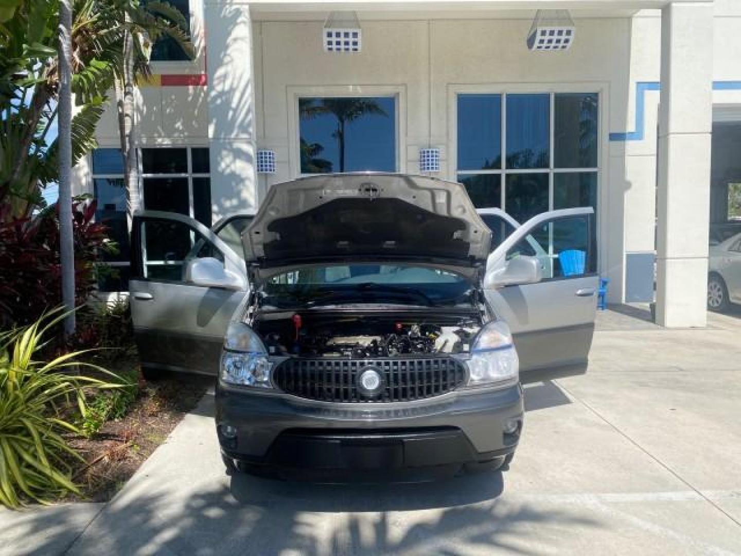 2005 Platinum Metallic /Gray Buick Rendezvous LOW MILES 81,783 3RD ROW (3G5DA03E15S) with an 3.4L 3400 V6 SFI Engine engine, Automatic transmission, located at 4701 North Dixie Hwy, Pompano Beach, FL, 33064, (954) 422-2889, 26.240938, -80.123474 - OUR WEBPAGE FLORIDACARS1.COM HAS OVER 100 PHOTOS AND FREE CARFAX LINK 2005 BUICK RENDEZVOUS CX VIN: 3G5DA03E15S512878 3 G 5 D A 0 3 E 1 5 S 5 1 2 8 7 8 4 DOOR WAGON/SPORT UTILITY 3.4L V6 F GASOLINE FRONT WHEEL DRIVE Top Features Front Seat Heaters Leather Seats Parking Sensors Sunroof(s) Third Row S - Photo#16