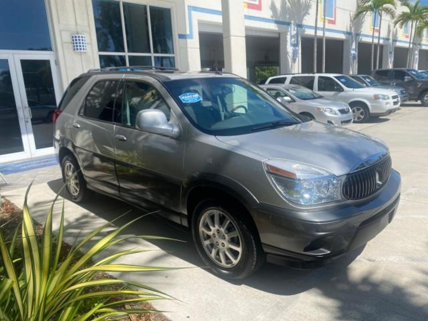 2005 Platinum Metallic /Gray Buick Rendezvous LOW MILES 81,783 3RD ROW (3G5DA03E15S) with an 3.4L 3400 V6 SFI Engine engine, Automatic transmission, located at 4701 North Dixie Hwy, Pompano Beach, FL, 33064, (954) 422-2889, 26.240938, -80.123474 - OUR WEBPAGE FLORIDACARS1.COM HAS OVER 100 PHOTOS AND FREE CARFAX LINK 2005 BUICK RENDEZVOUS CX VIN: 3G5DA03E15S512878 3 G 5 D A 0 3 E 1 5 S 5 1 2 8 7 8 4 DOOR WAGON/SPORT UTILITY 3.4L V6 F GASOLINE FRONT WHEEL DRIVE Top Features Front Seat Heaters Leather Seats Parking Sensors Sunroof(s) Third Row S - Photo#24