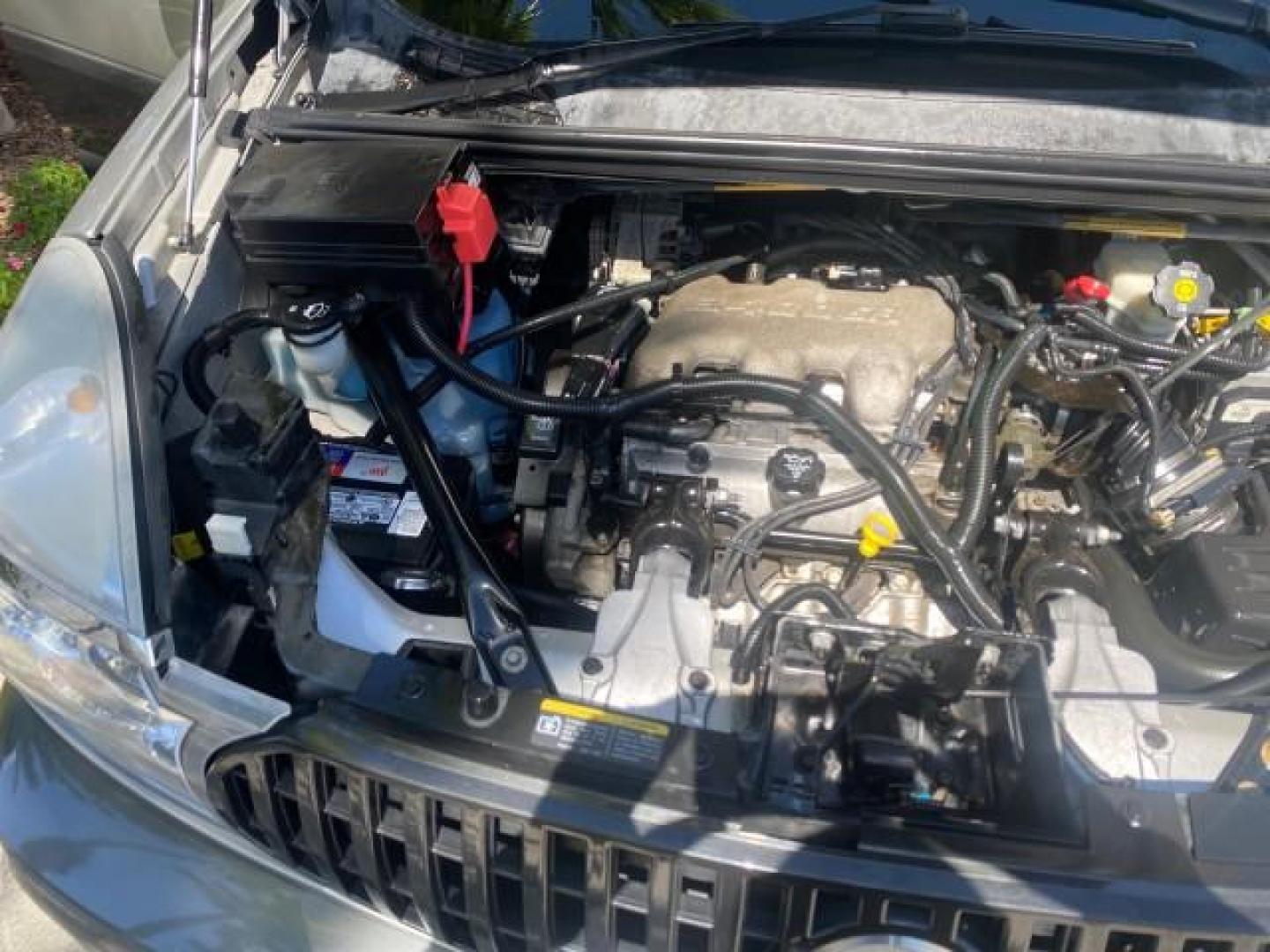 2005 Platinum Metallic /Gray Buick Rendezvous LOW MILES 81,783 3RD ROW (3G5DA03E15S) with an 3.4L 3400 V6 SFI Engine engine, Automatic transmission, located at 4701 North Dixie Hwy, Pompano Beach, FL, 33064, (954) 422-2889, 26.240938, -80.123474 - OUR WEBPAGE FLORIDACARS1.COM HAS OVER 100 PHOTOS AND FREE CARFAX LINK 2005 BUICK RENDEZVOUS CX VIN: 3G5DA03E15S512878 3 G 5 D A 0 3 E 1 5 S 5 1 2 8 7 8 4 DOOR WAGON/SPORT UTILITY 3.4L V6 F GASOLINE FRONT WHEEL DRIVE Top Features Front Seat Heaters Leather Seats Parking Sensors Sunroof(s) Third Row S - Photo#25