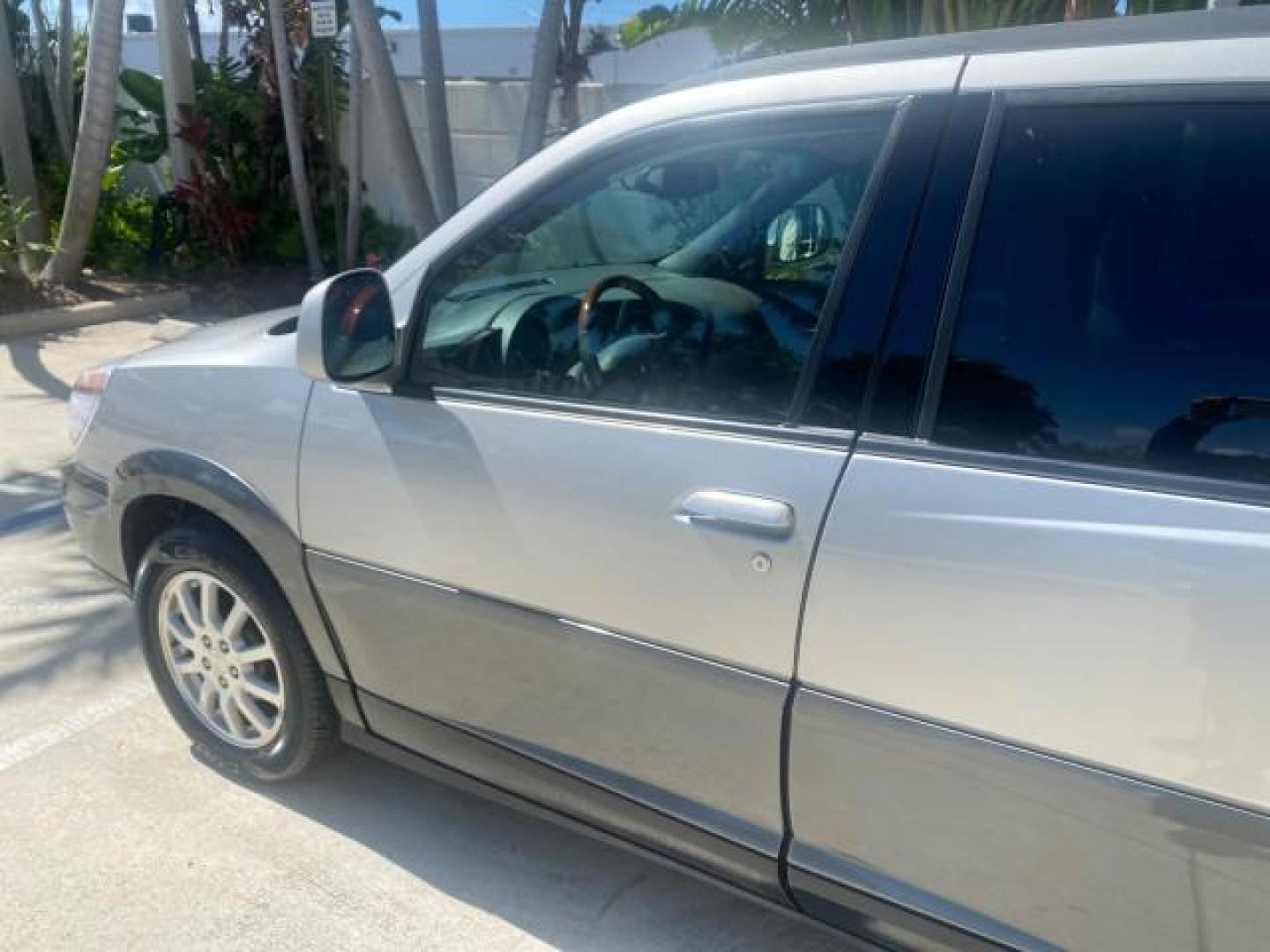 2005 Platinum Metallic /Gray Buick Rendezvous LOW MILES 81,783 3RD ROW (3G5DA03E15S) with an 3.4L 3400 V6 SFI Engine engine, Automatic transmission, located at 4701 North Dixie Hwy, Pompano Beach, FL, 33064, (954) 422-2889, 26.240938, -80.123474 - OUR WEBPAGE FLORIDACARS1.COM HAS OVER 100 PHOTOS AND FREE CARFAX LINK 2005 BUICK RENDEZVOUS CX VIN: 3G5DA03E15S512878 3 G 5 D A 0 3 E 1 5 S 5 1 2 8 7 8 4 DOOR WAGON/SPORT UTILITY 3.4L V6 F GASOLINE FRONT WHEEL DRIVE Top Features Front Seat Heaters Leather Seats Parking Sensors Sunroof(s) Third Row S - Photo#27