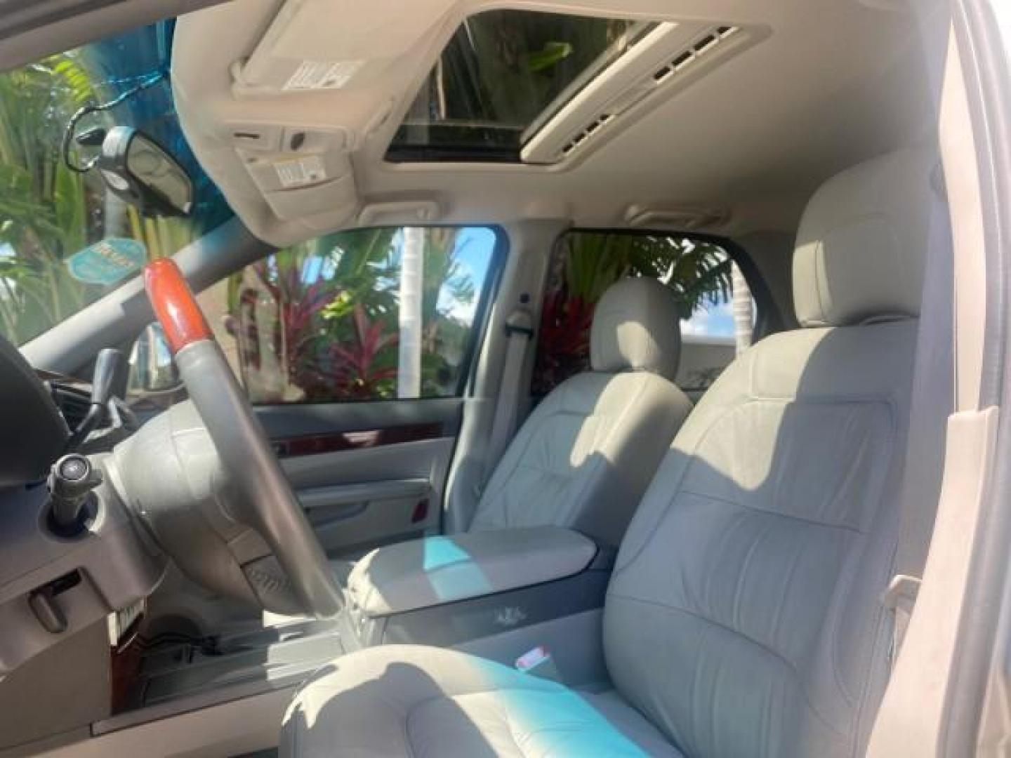 2005 Platinum Metallic /Gray Buick Rendezvous LOW MILES 81,783 3RD ROW (3G5DA03E15S) with an 3.4L 3400 V6 SFI Engine engine, Automatic transmission, located at 4701 North Dixie Hwy, Pompano Beach, FL, 33064, (954) 422-2889, 26.240938, -80.123474 - OUR WEBPAGE FLORIDACARS1.COM HAS OVER 100 PHOTOS AND FREE CARFAX LINK 2005 BUICK RENDEZVOUS CX VIN: 3G5DA03E15S512878 3 G 5 D A 0 3 E 1 5 S 5 1 2 8 7 8 4 DOOR WAGON/SPORT UTILITY 3.4L V6 F GASOLINE FRONT WHEEL DRIVE Top Features Front Seat Heaters Leather Seats Parking Sensors Sunroof(s) Third Row S - Photo#32