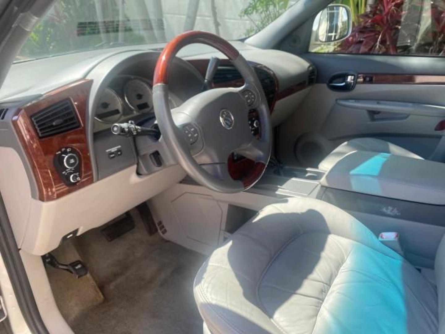 2005 Platinum Metallic /Gray Buick Rendezvous LOW MILES 81,783 3RD ROW (3G5DA03E15S) with an 3.4L 3400 V6 SFI Engine engine, Automatic transmission, located at 4701 North Dixie Hwy, Pompano Beach, FL, 33064, (954) 422-2889, 26.240938, -80.123474 - OUR WEBPAGE FLORIDACARS1.COM HAS OVER 100 PHOTOS AND FREE CARFAX LINK 2005 BUICK RENDEZVOUS CX VIN: 3G5DA03E15S512878 3 G 5 D A 0 3 E 1 5 S 5 1 2 8 7 8 4 DOOR WAGON/SPORT UTILITY 3.4L V6 F GASOLINE FRONT WHEEL DRIVE Top Features Front Seat Heaters Leather Seats Parking Sensors Sunroof(s) Third Row S - Photo#36