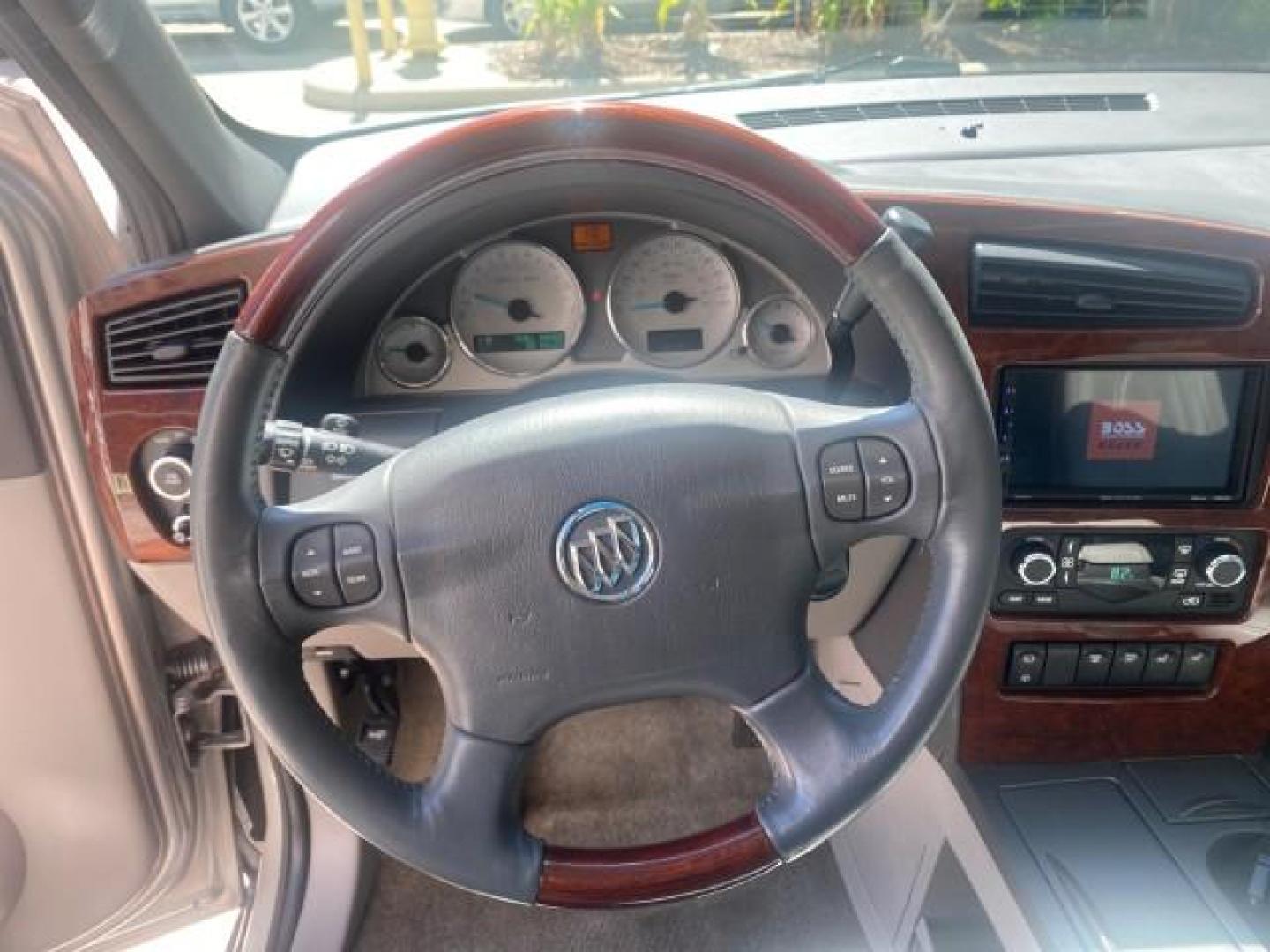 2005 Platinum Metallic /Gray Buick Rendezvous LOW MILES 81,783 3RD ROW (3G5DA03E15S) with an 3.4L 3400 V6 SFI Engine engine, Automatic transmission, located at 4701 North Dixie Hwy, Pompano Beach, FL, 33064, (954) 422-2889, 26.240938, -80.123474 - OUR WEBPAGE FLORIDACARS1.COM HAS OVER 100 PHOTOS AND FREE CARFAX LINK 2005 BUICK RENDEZVOUS CX VIN: 3G5DA03E15S512878 3 G 5 D A 0 3 E 1 5 S 5 1 2 8 7 8 4 DOOR WAGON/SPORT UTILITY 3.4L V6 F GASOLINE FRONT WHEEL DRIVE Top Features Front Seat Heaters Leather Seats Parking Sensors Sunroof(s) Third Row S - Photo#38