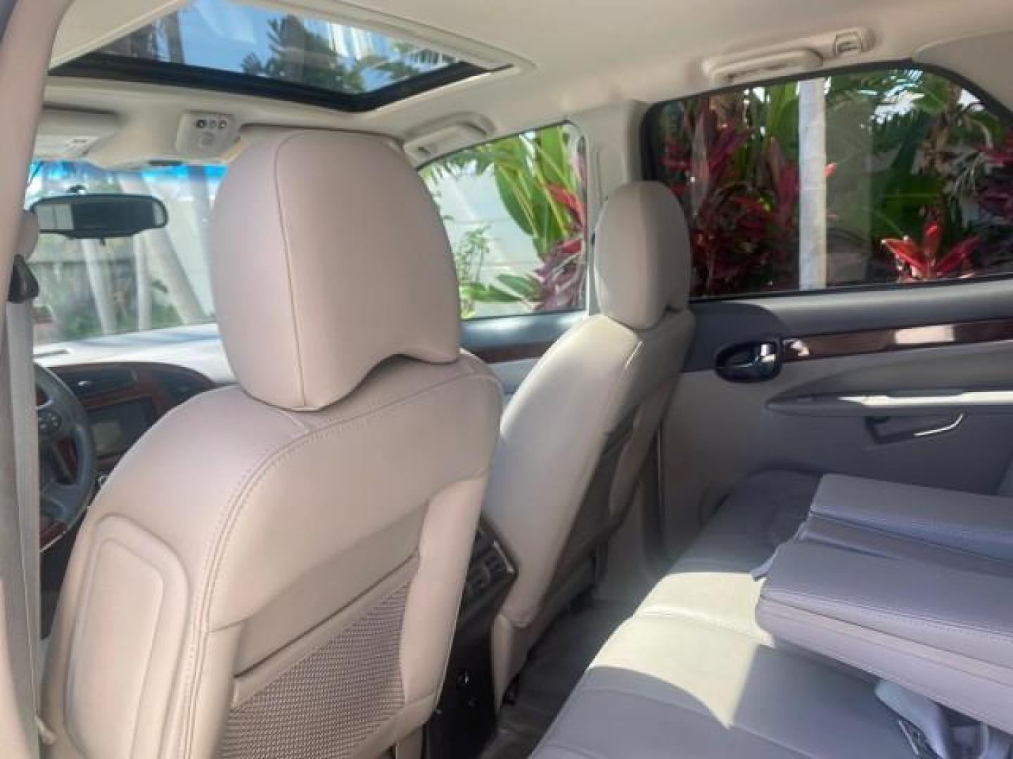 2005 Platinum Metallic /Gray Buick Rendezvous LOW MILES 81,783 3RD ROW (3G5DA03E15S) with an 3.4L 3400 V6 SFI Engine engine, Automatic transmission, located at 4701 North Dixie Hwy, Pompano Beach, FL, 33064, (954) 422-2889, 26.240938, -80.123474 - OUR WEBPAGE FLORIDACARS1.COM HAS OVER 100 PHOTOS AND FREE CARFAX LINK 2005 BUICK RENDEZVOUS CX VIN: 3G5DA03E15S512878 3 G 5 D A 0 3 E 1 5 S 5 1 2 8 7 8 4 DOOR WAGON/SPORT UTILITY 3.4L V6 F GASOLINE FRONT WHEEL DRIVE Top Features Front Seat Heaters Leather Seats Parking Sensors Sunroof(s) Third Row S - Photo#70