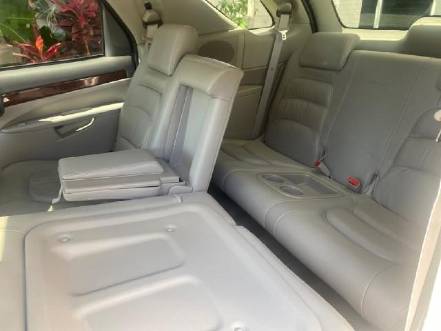 2005 Platinum Metallic /Gray Buick Rendezvous LOW MILES 81,783 3RD ROW (3G5DA03E15S) with an 3.4L 3400 V6 SFI Engine engine, Automatic transmission, located at 4701 North Dixie Hwy, Pompano Beach, FL, 33064, (954) 422-2889, 26.240938, -80.123474 - OUR WEBPAGE FLORIDACARS1.COM HAS OVER 100 PHOTOS AND FREE CARFAX LINK 2005 BUICK RENDEZVOUS CX VIN: 3G5DA03E15S512878 3 G 5 D A 0 3 E 1 5 S 5 1 2 8 7 8 4 DOOR WAGON/SPORT UTILITY 3.4L V6 F GASOLINE FRONT WHEEL DRIVE Top Features Front Seat Heaters Leather Seats Parking Sensors Sunroof(s) Third Row S - Photo#75