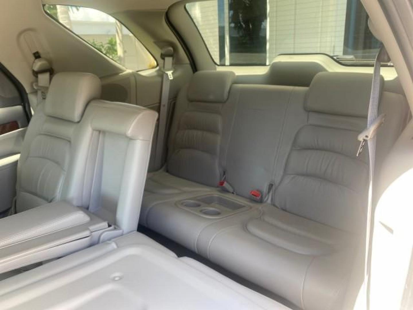 2005 Platinum Metallic /Gray Buick Rendezvous LOW MILES 81,783 3RD ROW (3G5DA03E15S) with an 3.4L 3400 V6 SFI Engine engine, Automatic transmission, located at 4701 North Dixie Hwy, Pompano Beach, FL, 33064, (954) 422-2889, 26.240938, -80.123474 - OUR WEBPAGE FLORIDACARS1.COM HAS OVER 100 PHOTOS AND FREE CARFAX LINK 2005 BUICK RENDEZVOUS CX VIN: 3G5DA03E15S512878 3 G 5 D A 0 3 E 1 5 S 5 1 2 8 7 8 4 DOOR WAGON/SPORT UTILITY 3.4L V6 F GASOLINE FRONT WHEEL DRIVE Top Features Front Seat Heaters Leather Seats Parking Sensors Sunroof(s) Third Row S - Photo#76
