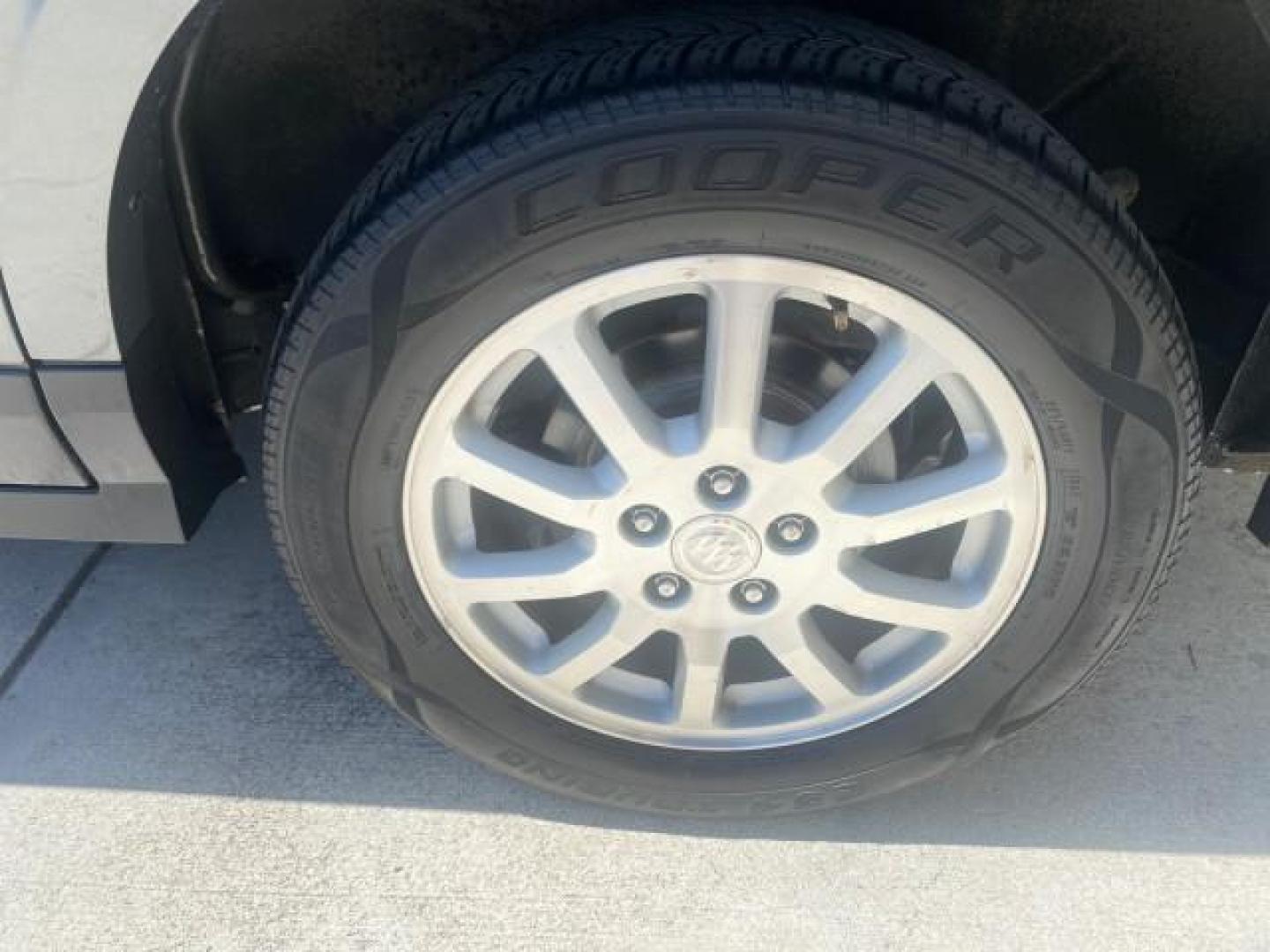 2005 Platinum Metallic /Gray Buick Rendezvous LOW MILES 81,783 3RD ROW (3G5DA03E15S) with an 3.4L 3400 V6 SFI Engine engine, Automatic transmission, located at 4701 North Dixie Hwy, Pompano Beach, FL, 33064, (954) 422-2889, 26.240938, -80.123474 - OUR WEBPAGE FLORIDACARS1.COM HAS OVER 100 PHOTOS AND FREE CARFAX LINK 2005 BUICK RENDEZVOUS CX VIN: 3G5DA03E15S512878 3 G 5 D A 0 3 E 1 5 S 5 1 2 8 7 8 4 DOOR WAGON/SPORT UTILITY 3.4L V6 F GASOLINE FRONT WHEEL DRIVE Top Features Front Seat Heaters Leather Seats Parking Sensors Sunroof(s) Third Row S - Photo#77