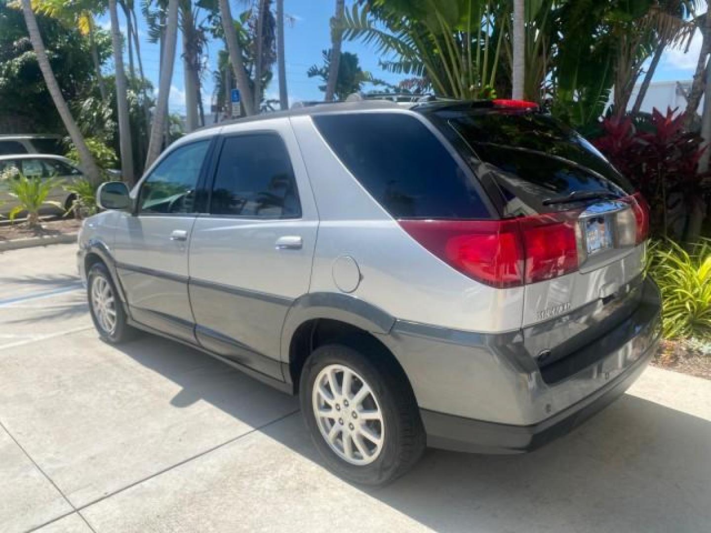 2005 Platinum Metallic /Gray Buick Rendezvous LOW MILES 81,783 3RD ROW (3G5DA03E15S) with an 3.4L 3400 V6 SFI Engine engine, Automatic transmission, located at 4701 North Dixie Hwy, Pompano Beach, FL, 33064, (954) 422-2889, 26.240938, -80.123474 - OUR WEBPAGE FLORIDACARS1.COM HAS OVER 100 PHOTOS AND FREE CARFAX LINK 2005 BUICK RENDEZVOUS CX VIN: 3G5DA03E15S512878 3 G 5 D A 0 3 E 1 5 S 5 1 2 8 7 8 4 DOOR WAGON/SPORT UTILITY 3.4L V6 F GASOLINE FRONT WHEEL DRIVE Top Features Front Seat Heaters Leather Seats Parking Sensors Sunroof(s) Third Row S - Photo#81