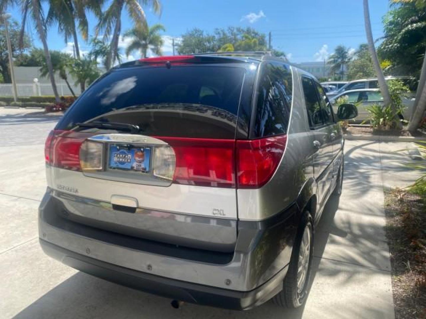 2005 Platinum Metallic /Gray Buick Rendezvous LOW MILES 81,783 3RD ROW (3G5DA03E15S) with an 3.4L 3400 V6 SFI Engine engine, Automatic transmission, located at 4701 North Dixie Hwy, Pompano Beach, FL, 33064, (954) 422-2889, 26.240938, -80.123474 - OUR WEBPAGE FLORIDACARS1.COM HAS OVER 100 PHOTOS AND FREE CARFAX LINK 2005 BUICK RENDEZVOUS CX VIN: 3G5DA03E15S512878 3 G 5 D A 0 3 E 1 5 S 5 1 2 8 7 8 4 DOOR WAGON/SPORT UTILITY 3.4L V6 F GASOLINE FRONT WHEEL DRIVE Top Features Front Seat Heaters Leather Seats Parking Sensors Sunroof(s) Third Row S - Photo#83