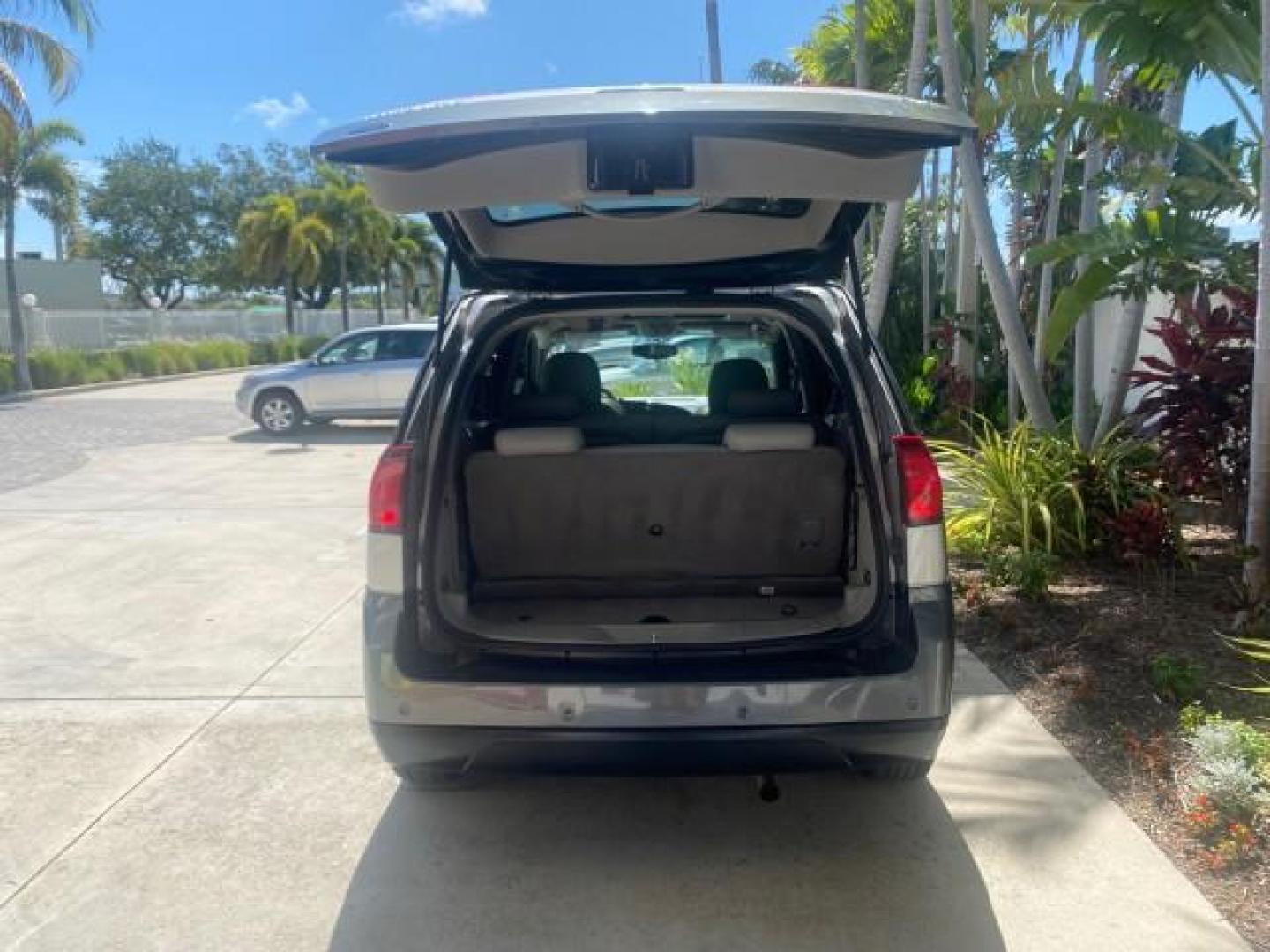 2005 Platinum Metallic /Gray Buick Rendezvous LOW MILES 81,783 3RD ROW (3G5DA03E15S) with an 3.4L 3400 V6 SFI Engine engine, Automatic transmission, located at 4701 North Dixie Hwy, Pompano Beach, FL, 33064, (954) 422-2889, 26.240938, -80.123474 - OUR WEBPAGE FLORIDACARS1.COM HAS OVER 100 PHOTOS AND FREE CARFAX LINK 2005 BUICK RENDEZVOUS CX VIN: 3G5DA03E15S512878 3 G 5 D A 0 3 E 1 5 S 5 1 2 8 7 8 4 DOOR WAGON/SPORT UTILITY 3.4L V6 F GASOLINE FRONT WHEEL DRIVE Top Features Front Seat Heaters Leather Seats Parking Sensors Sunroof(s) Third Row S - Photo#87