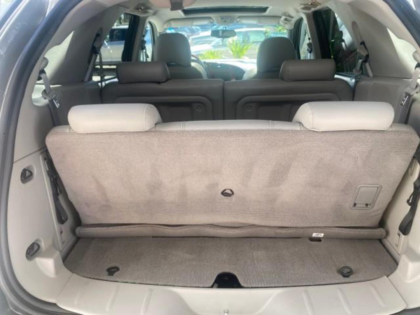 2005 Platinum Metallic /Gray Buick Rendezvous LOW MILES 81,783 3RD ROW (3G5DA03E15S) with an 3.4L 3400 V6 SFI Engine engine, Automatic transmission, located at 4701 North Dixie Hwy, Pompano Beach, FL, 33064, (954) 422-2889, 26.240938, -80.123474 - OUR WEBPAGE FLORIDACARS1.COM HAS OVER 100 PHOTOS AND FREE CARFAX LINK 2005 BUICK RENDEZVOUS CX VIN: 3G5DA03E15S512878 3 G 5 D A 0 3 E 1 5 S 5 1 2 8 7 8 4 DOOR WAGON/SPORT UTILITY 3.4L V6 F GASOLINE FRONT WHEEL DRIVE Top Features Front Seat Heaters Leather Seats Parking Sensors Sunroof(s) Third Row S - Photo#89