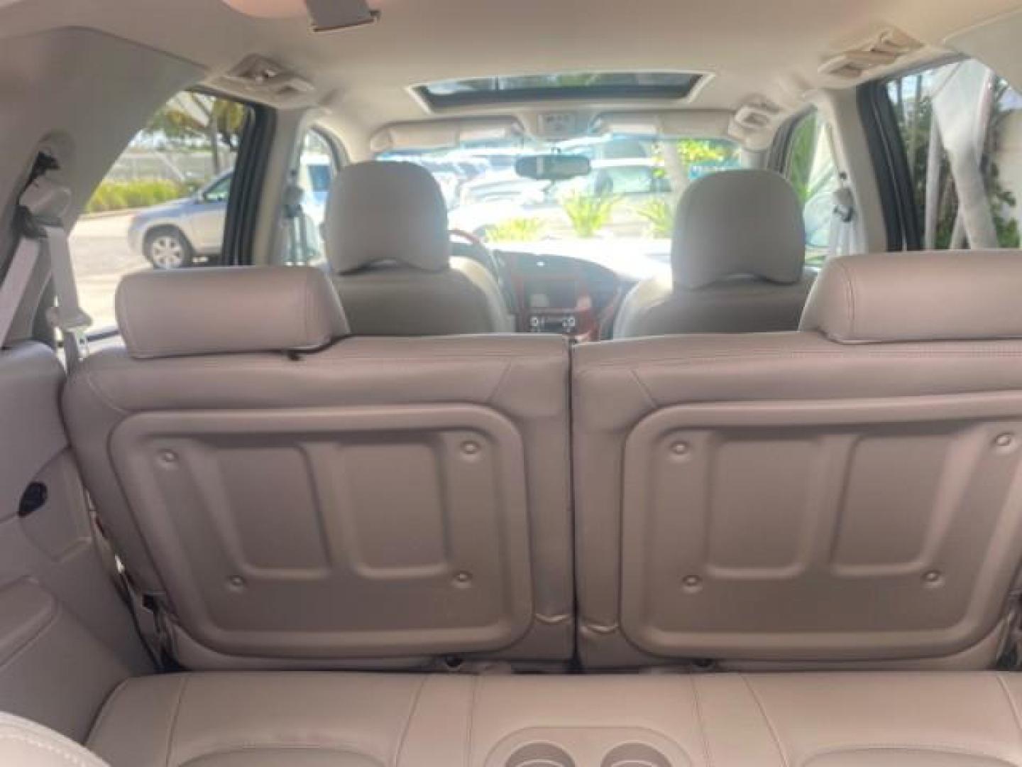 2005 Platinum Metallic /Gray Buick Rendezvous LOW MILES 81,783 3RD ROW (3G5DA03E15S) with an 3.4L 3400 V6 SFI Engine engine, Automatic transmission, located at 4701 North Dixie Hwy, Pompano Beach, FL, 33064, (954) 422-2889, 26.240938, -80.123474 - OUR WEBPAGE FLORIDACARS1.COM HAS OVER 100 PHOTOS AND FREE CARFAX LINK 2005 BUICK RENDEZVOUS CX VIN: 3G5DA03E15S512878 3 G 5 D A 0 3 E 1 5 S 5 1 2 8 7 8 4 DOOR WAGON/SPORT UTILITY 3.4L V6 F GASOLINE FRONT WHEEL DRIVE Top Features Front Seat Heaters Leather Seats Parking Sensors Sunroof(s) Third Row S - Photo#90