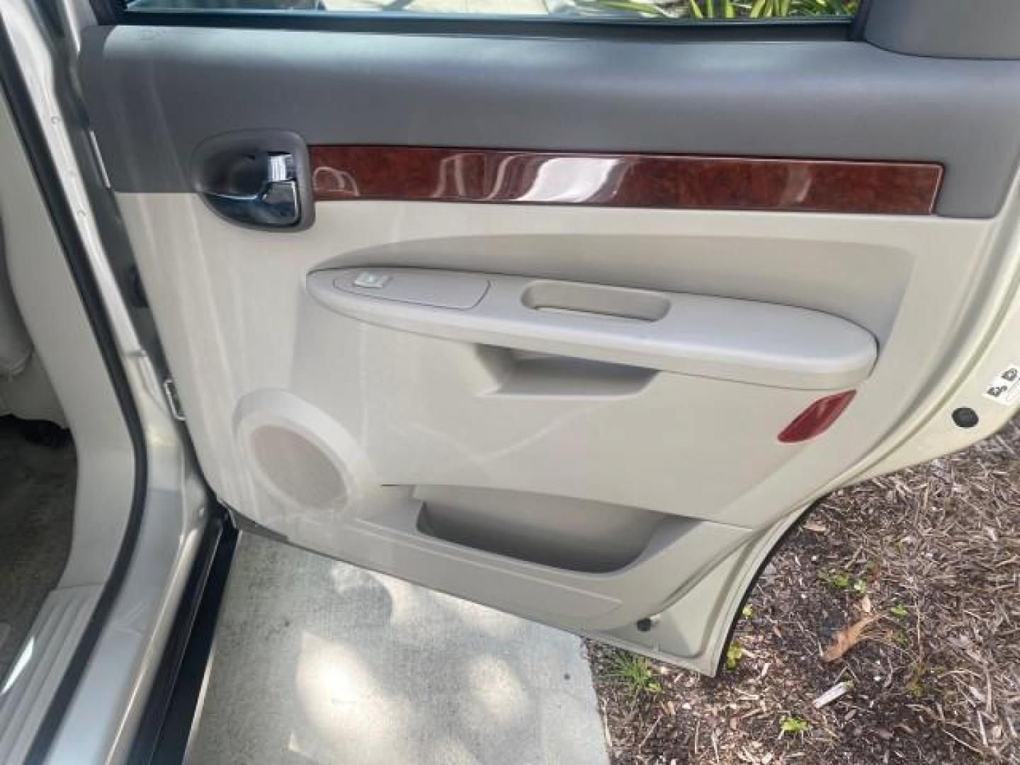 2005 Platinum Metallic /Gray Buick Rendezvous LOW MILES 81,783 3RD ROW (3G5DA03E15S) with an 3.4L 3400 V6 SFI Engine engine, Automatic transmission, located at 4701 North Dixie Hwy, Pompano Beach, FL, 33064, (954) 422-2889, 26.240938, -80.123474 - OUR WEBPAGE FLORIDACARS1.COM HAS OVER 100 PHOTOS AND FREE CARFAX LINK 2005 BUICK RENDEZVOUS CX VIN: 3G5DA03E15S512878 3 G 5 D A 0 3 E 1 5 S 5 1 2 8 7 8 4 DOOR WAGON/SPORT UTILITY 3.4L V6 F GASOLINE FRONT WHEEL DRIVE Top Features Front Seat Heaters Leather Seats Parking Sensors Sunroof(s) Third Row S - Photo#97