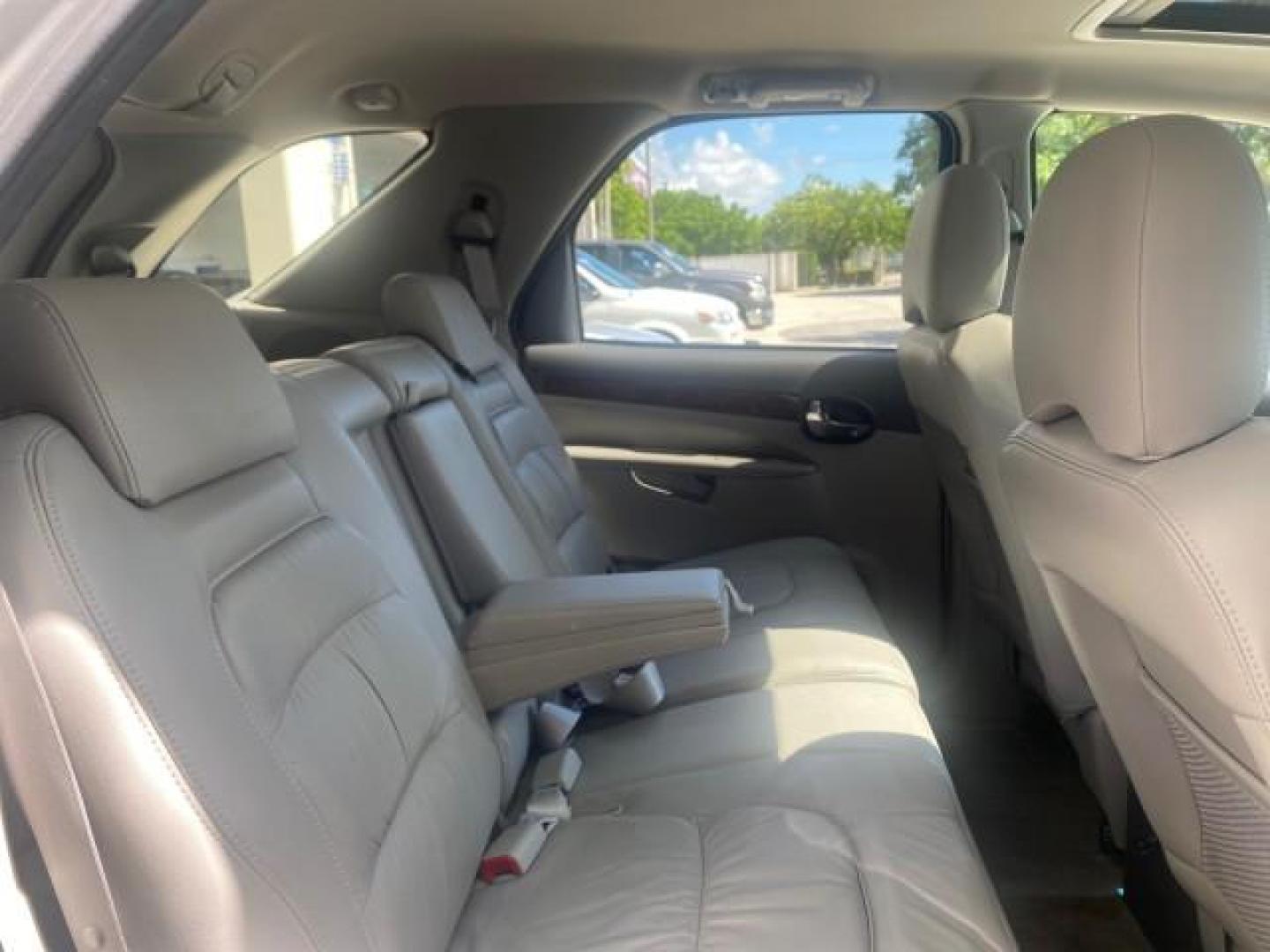 2005 Platinum Metallic /Gray Buick Rendezvous LOW MILES 81,783 3RD ROW (3G5DA03E15S) with an 3.4L 3400 V6 SFI Engine engine, Automatic transmission, located at 4701 North Dixie Hwy, Pompano Beach, FL, 33064, (954) 422-2889, 26.240938, -80.123474 - OUR WEBPAGE FLORIDACARS1.COM HAS OVER 100 PHOTOS AND FREE CARFAX LINK 2005 BUICK RENDEZVOUS CX VIN: 3G5DA03E15S512878 3 G 5 D A 0 3 E 1 5 S 5 1 2 8 7 8 4 DOOR WAGON/SPORT UTILITY 3.4L V6 F GASOLINE FRONT WHEEL DRIVE Top Features Front Seat Heaters Leather Seats Parking Sensors Sunroof(s) Third Row S - Photo#98