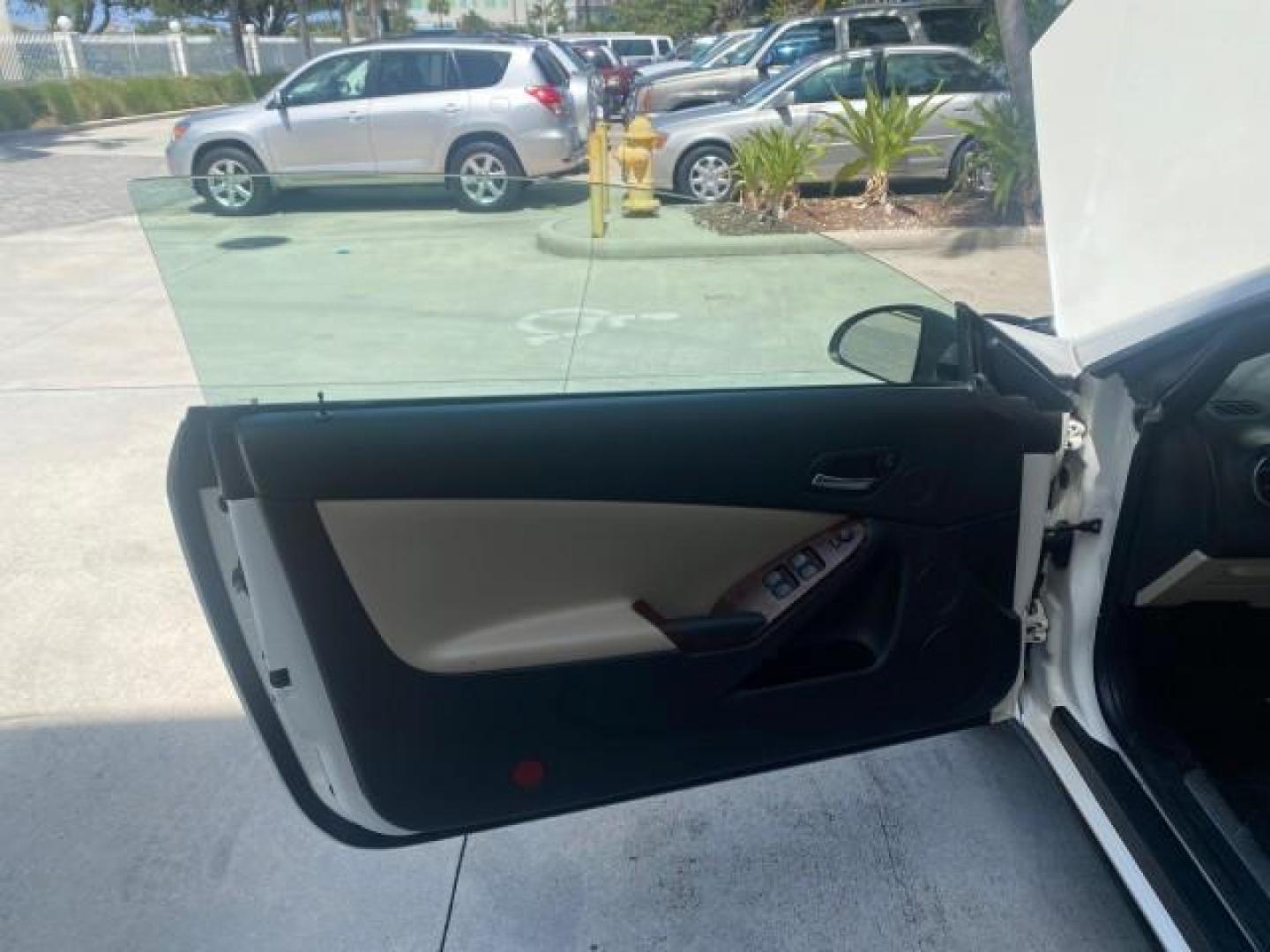 2008 White Diamond Tricoat /Light Taupe Pontiac G6 GT LOW MILES 44,047 (1G2ZH361484) with an 3.9L VVT V6 SFI Engine engine, Automatic transmission, located at 4701 North Dixie Hwy, Pompano Beach, FL, 33064, (954) 422-2889, 26.240938, -80.123474 - OUR WEBPAGE FLORIDACARS1.COM HAS OVER 100 PHOTOS AND FREE CARFAX LINK 2008 PONTIAC G6 GT VIN: 1G2ZH361484136254 1 G 2 Z H 3 6 1 4 8 4 1 3 6 2 5 4 CONVERTIBLE 3.9L V6 F GASOLINE FRONT WHEEL DRIVE Top Features Alloy Wheels Front Seat Heaters Hard Top Leather Seats Monsoon Sound Premium Package Satelli - Photo#9