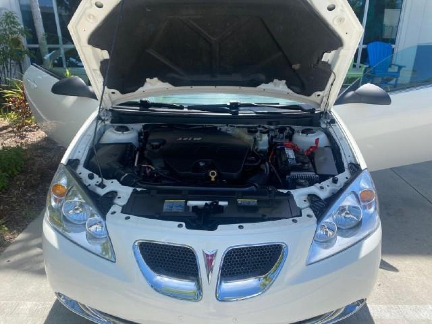 2008 White Diamond Tricoat /Light Taupe Pontiac G6 GT LOW MILES 44,047 (1G2ZH361484) with an 3.9L VVT V6 SFI Engine engine, Automatic transmission, located at 4701 North Dixie Hwy, Pompano Beach, FL, 33064, (954) 422-2889, 26.240938, -80.123474 - OUR WEBPAGE FLORIDACARS1.COM HAS OVER 100 PHOTOS AND FREE CARFAX LINK 2008 PONTIAC G6 GT VIN: 1G2ZH361484136254 1 G 2 Z H 3 6 1 4 8 4 1 3 6 2 5 4 CONVERTIBLE 3.9L V6 F GASOLINE FRONT WHEEL DRIVE Top Features Alloy Wheels Front Seat Heaters Hard Top Leather Seats Monsoon Sound Premium Package Satelli - Photo#17