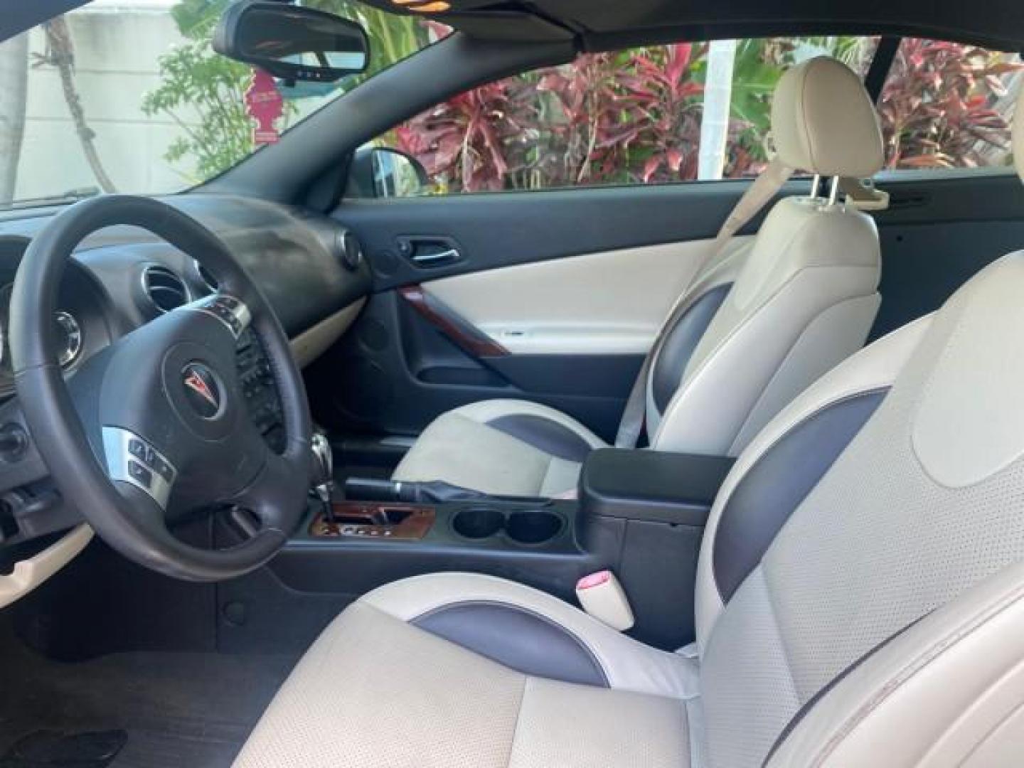 2008 White Diamond Tricoat /Light Taupe Pontiac G6 GT LOW MILES 44,047 (1G2ZH361484) with an 3.9L VVT V6 SFI Engine engine, Automatic transmission, located at 4701 North Dixie Hwy, Pompano Beach, FL, 33064, (954) 422-2889, 26.240938, -80.123474 - OUR WEBPAGE FLORIDACARS1.COM HAS OVER 100 PHOTOS AND FREE CARFAX LINK 2008 PONTIAC G6 GT VIN: 1G2ZH361484136254 1 G 2 Z H 3 6 1 4 8 4 1 3 6 2 5 4 CONVERTIBLE 3.9L V6 F GASOLINE FRONT WHEEL DRIVE Top Features Alloy Wheels Front Seat Heaters Hard Top Leather Seats Monsoon Sound Premium Package Satelli - Photo#35