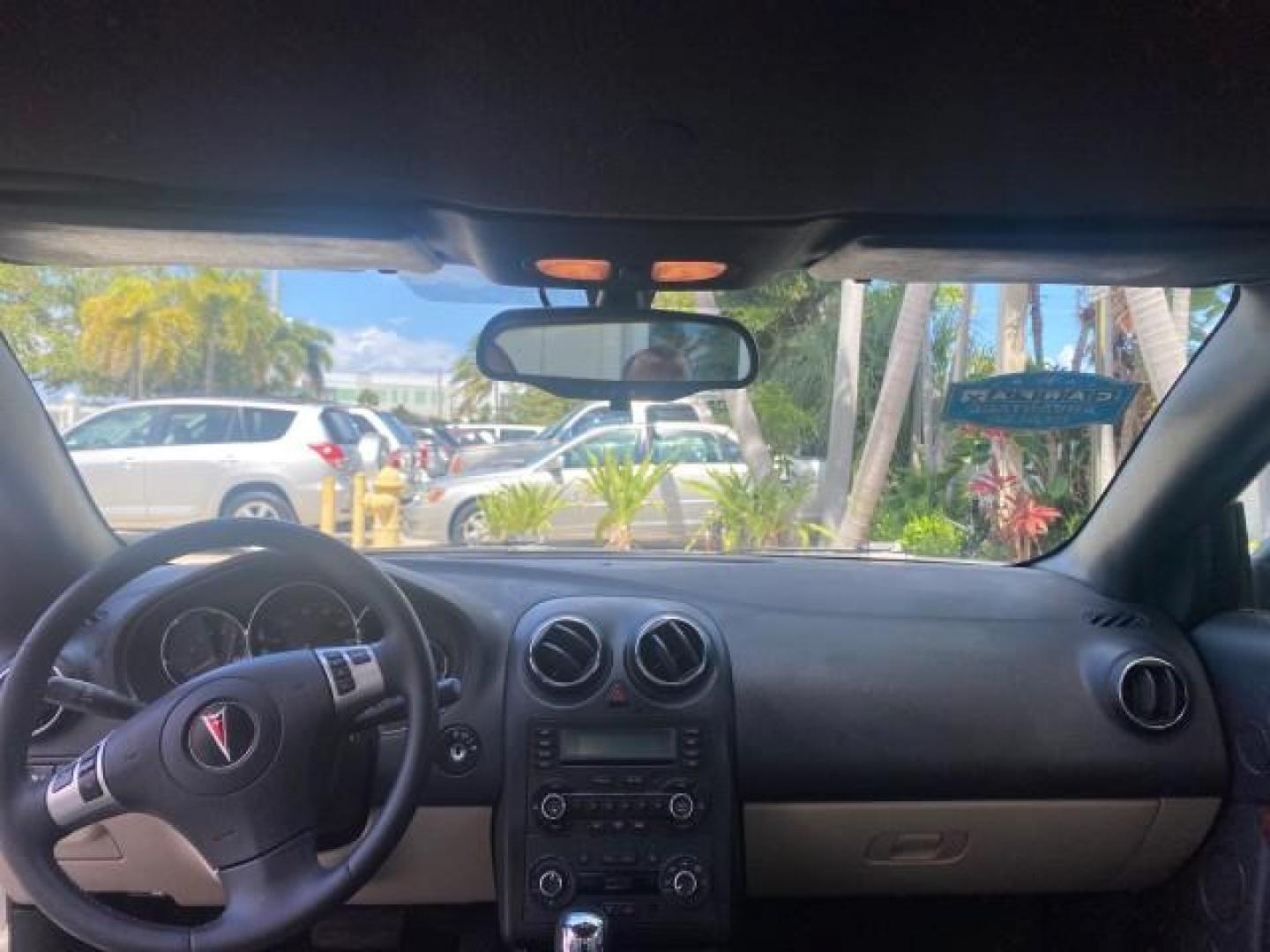 2008 White Diamond Tricoat /Light Taupe Pontiac G6 GT LOW MILES 44,047 (1G2ZH361484) with an 3.9L VVT V6 SFI Engine engine, Automatic transmission, located at 4701 North Dixie Hwy, Pompano Beach, FL, 33064, (954) 422-2889, 26.240938, -80.123474 - OUR WEBPAGE FLORIDACARS1.COM HAS OVER 100 PHOTOS AND FREE CARFAX LINK 2008 PONTIAC G6 GT VIN: 1G2ZH361484136254 1 G 2 Z H 3 6 1 4 8 4 1 3 6 2 5 4 CONVERTIBLE 3.9L V6 F GASOLINE FRONT WHEEL DRIVE Top Features Alloy Wheels Front Seat Heaters Hard Top Leather Seats Monsoon Sound Premium Package Satelli - Photo#68
