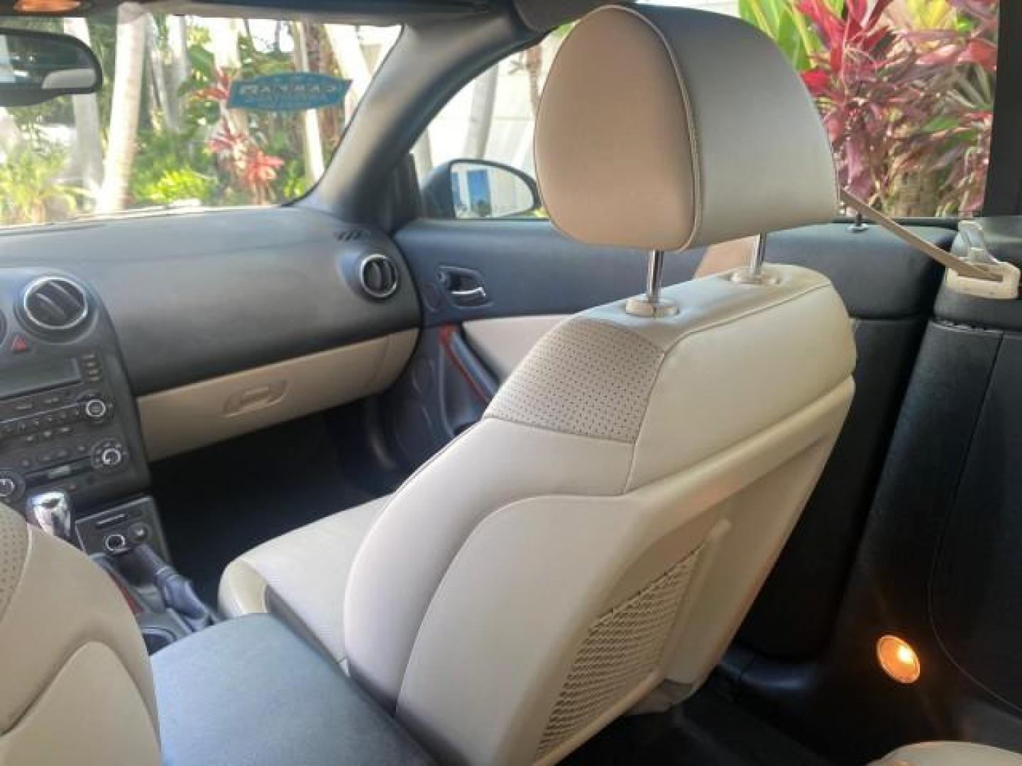 2008 White Diamond Tricoat /Light Taupe Pontiac G6 GT LOW MILES 44,047 (1G2ZH361484) with an 3.9L VVT V6 SFI Engine engine, Automatic transmission, located at 4701 North Dixie Hwy, Pompano Beach, FL, 33064, (954) 422-2889, 26.240938, -80.123474 - OUR WEBPAGE FLORIDACARS1.COM HAS OVER 100 PHOTOS AND FREE CARFAX LINK 2008 PONTIAC G6 GT VIN: 1G2ZH361484136254 1 G 2 Z H 3 6 1 4 8 4 1 3 6 2 5 4 CONVERTIBLE 3.9L V6 F GASOLINE FRONT WHEEL DRIVE Top Features Alloy Wheels Front Seat Heaters Hard Top Leather Seats Monsoon Sound Premium Package Satelli - Photo#69